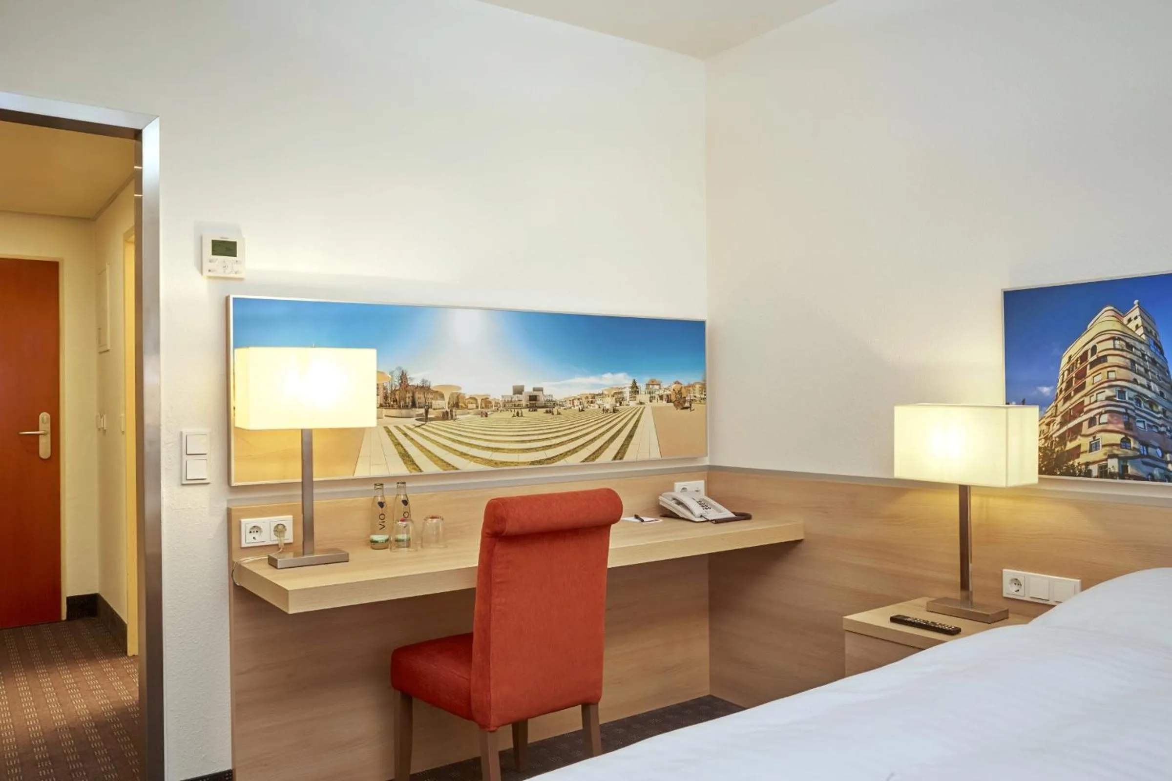 Photo of the whole room, Bed in H+ Hotel Darmstadt