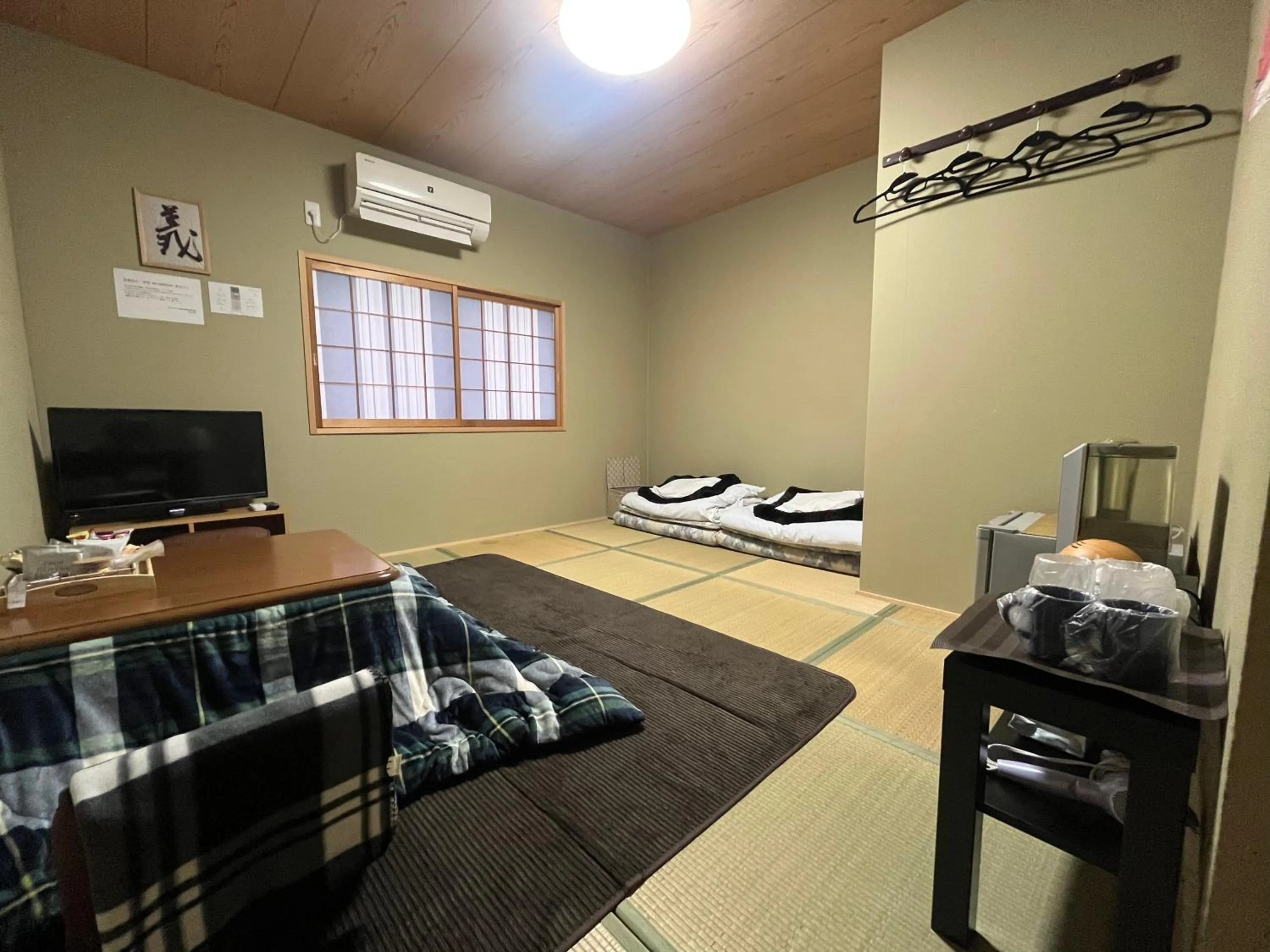 Bed in Wafu Ryokan Uehonmachi