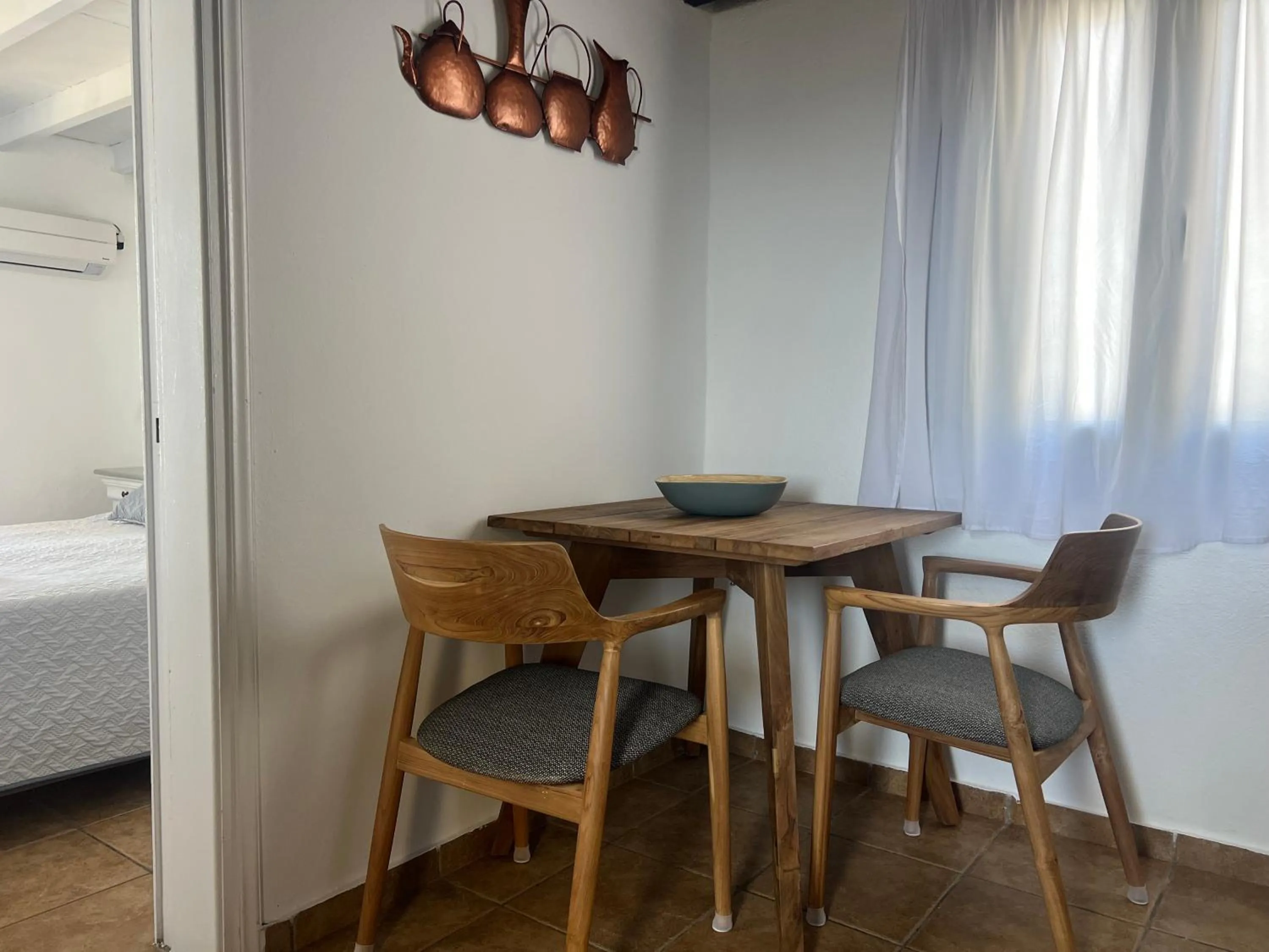 Dining area, Bed in Aspa Villas