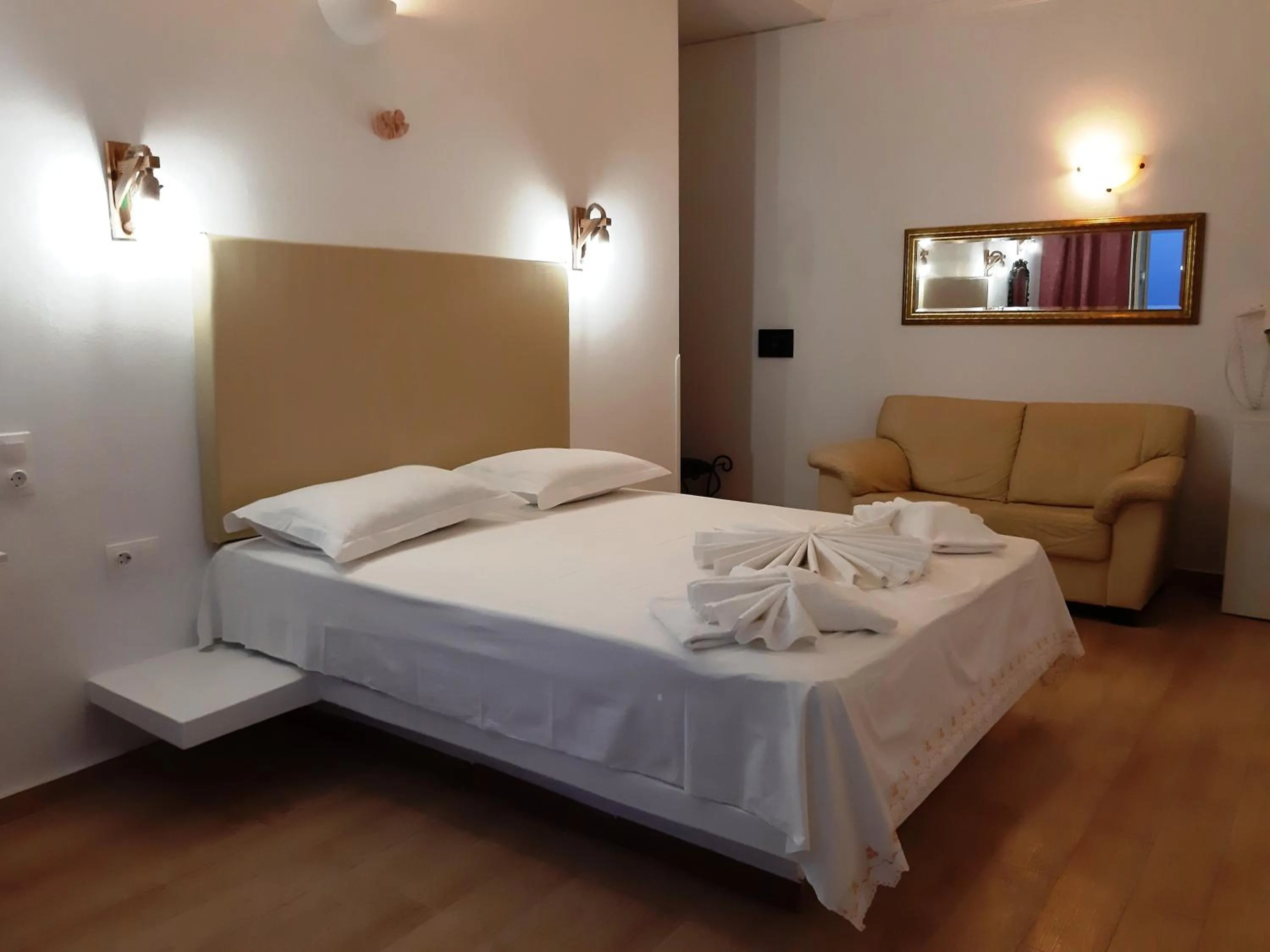 Bed in Atalos Suites