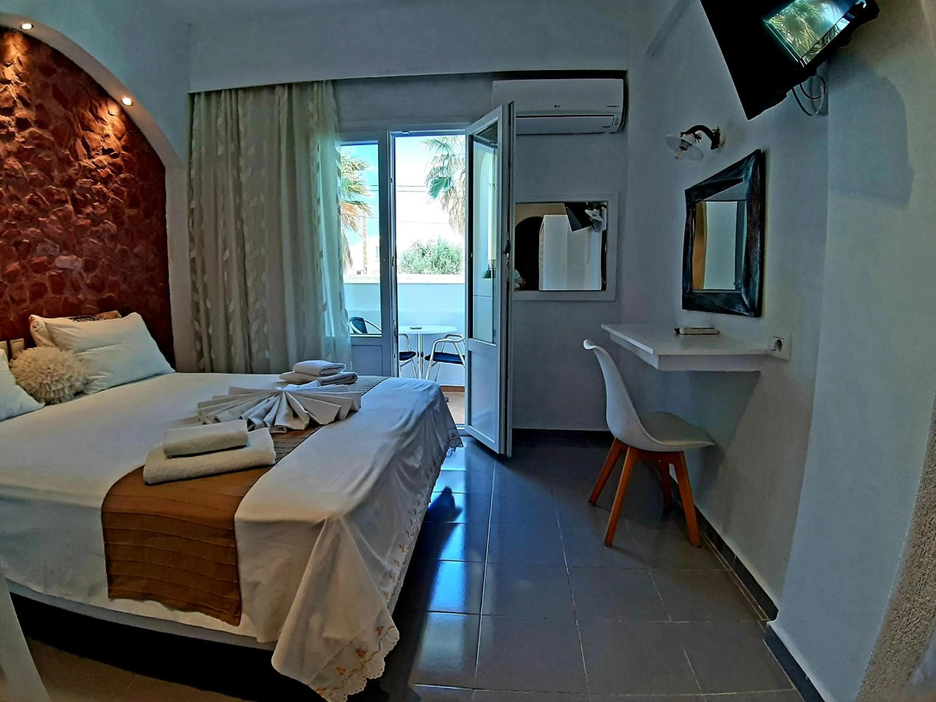 Bed in Atalos Suites