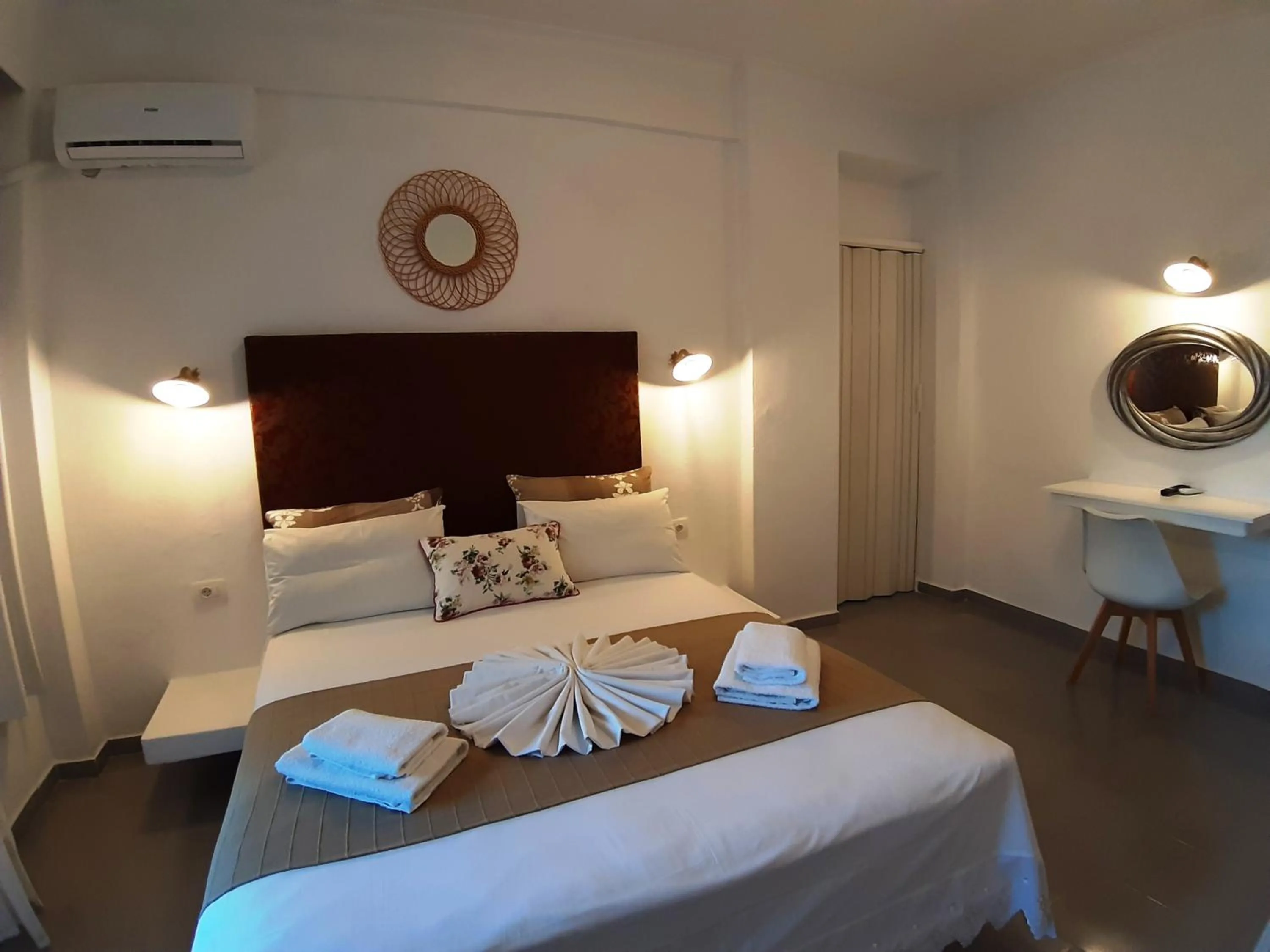 Bed in Atalos Suites