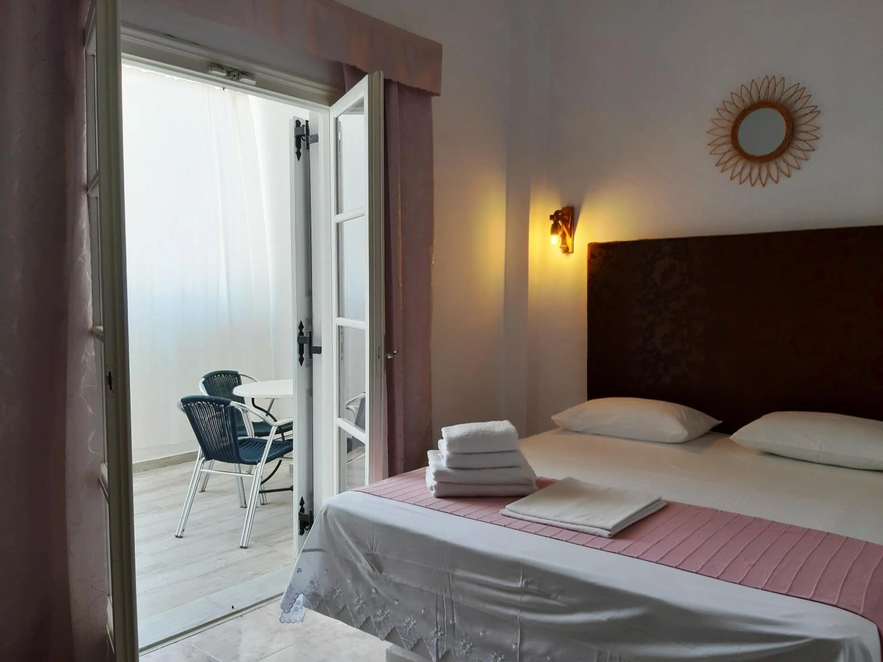 Bed in Atalos Suites