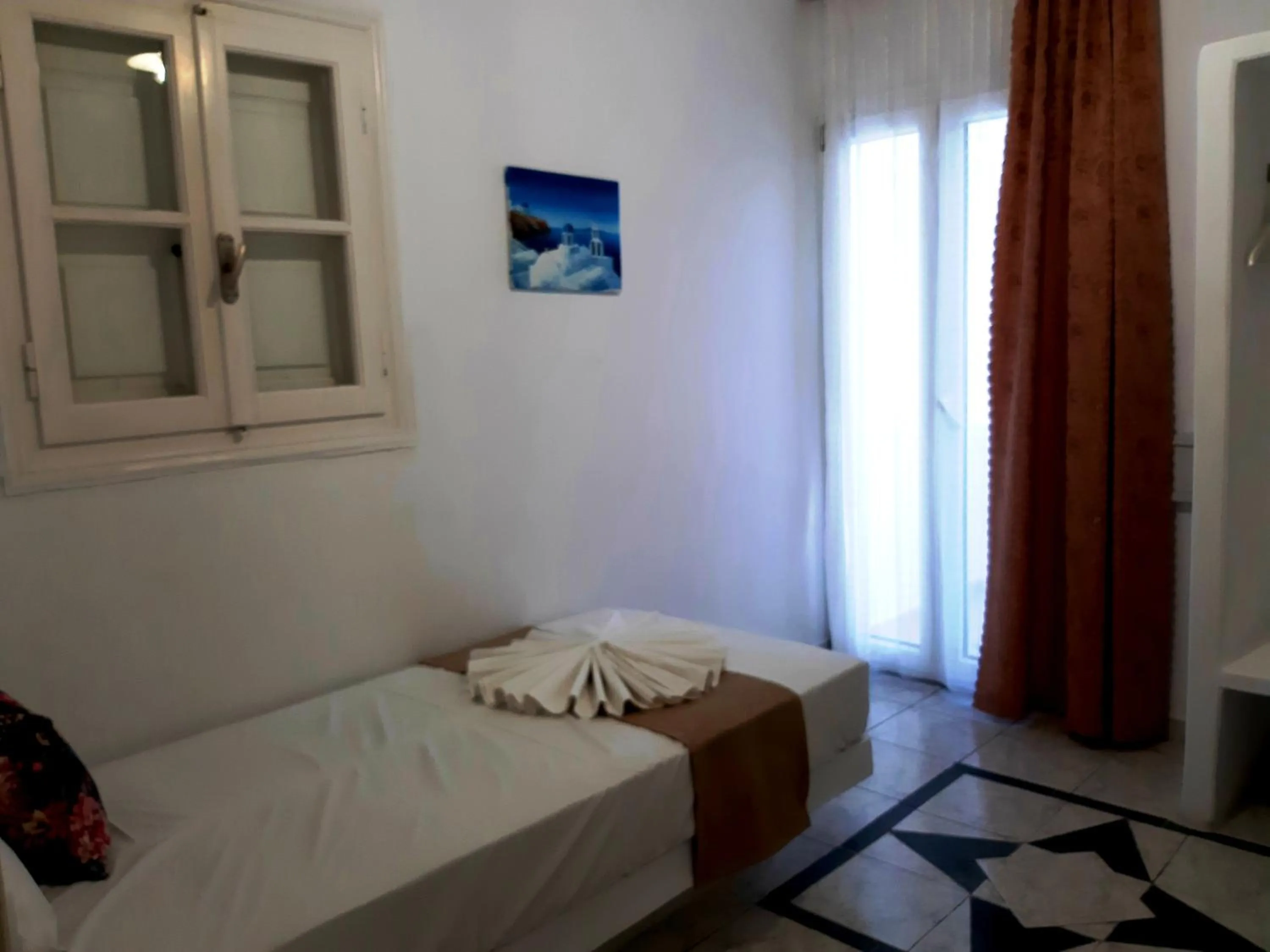 Bed in Atalos Suites