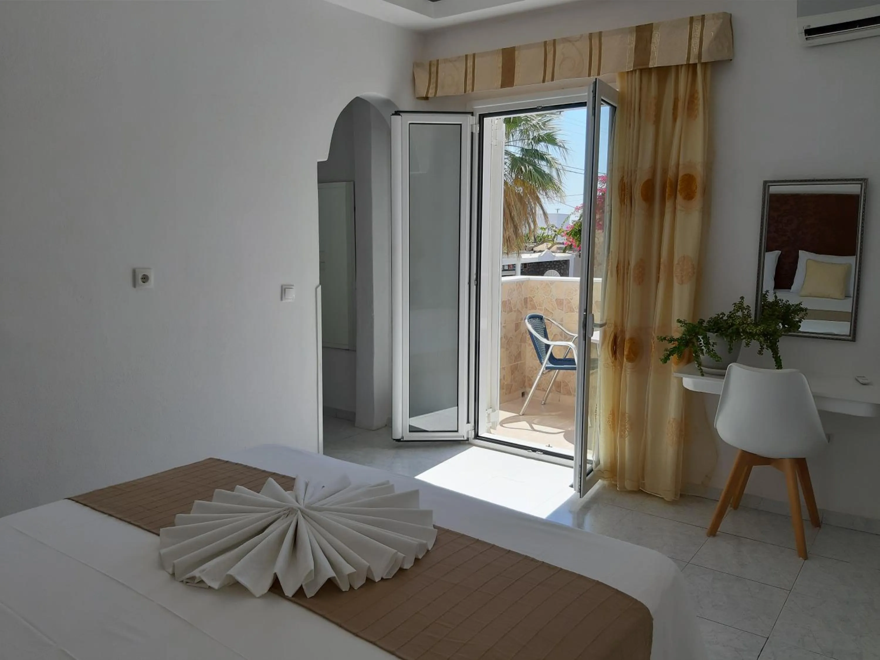 Bed in Atalos Suites