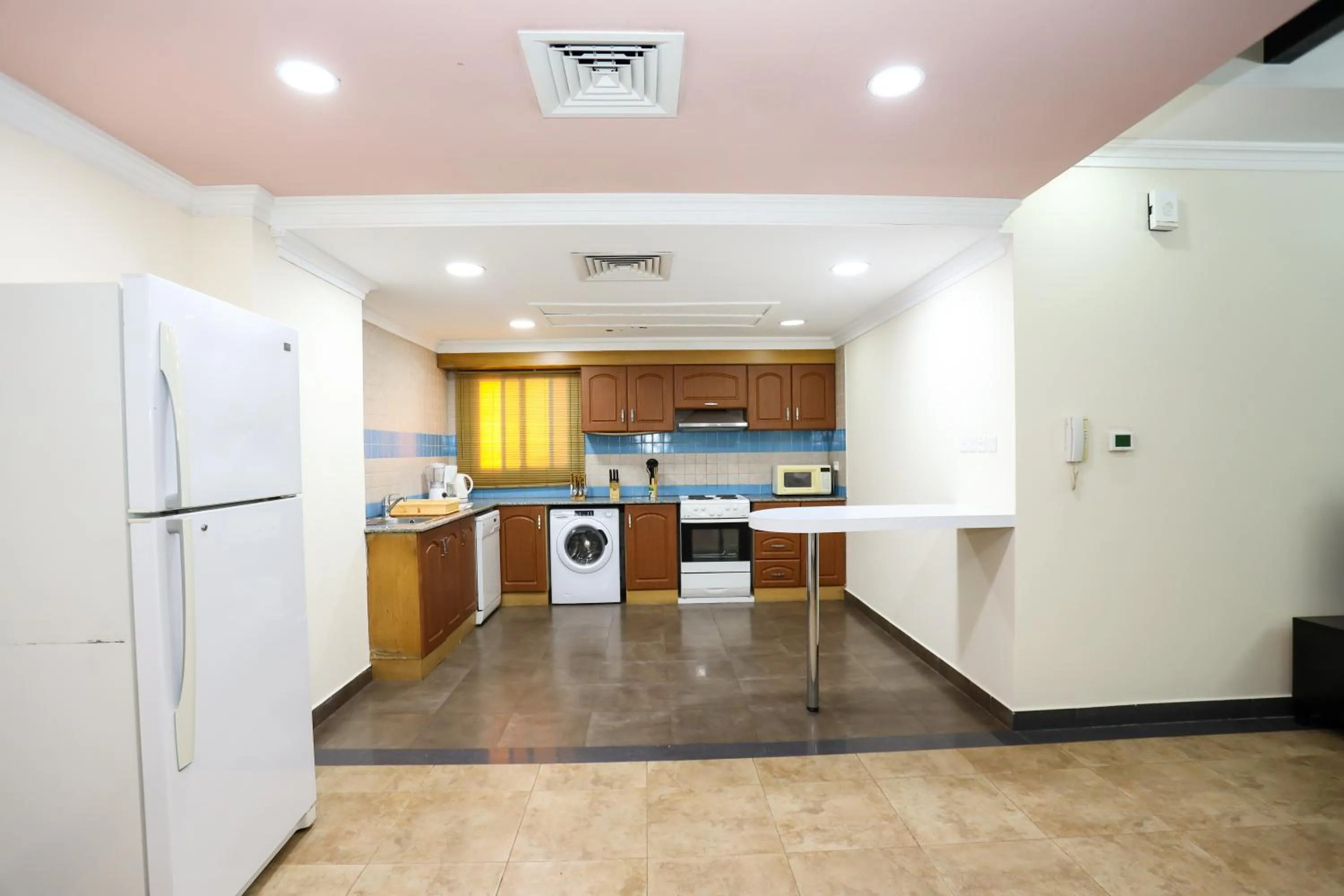 Kitchen or kitchenette in Pearl Bahrain Suites