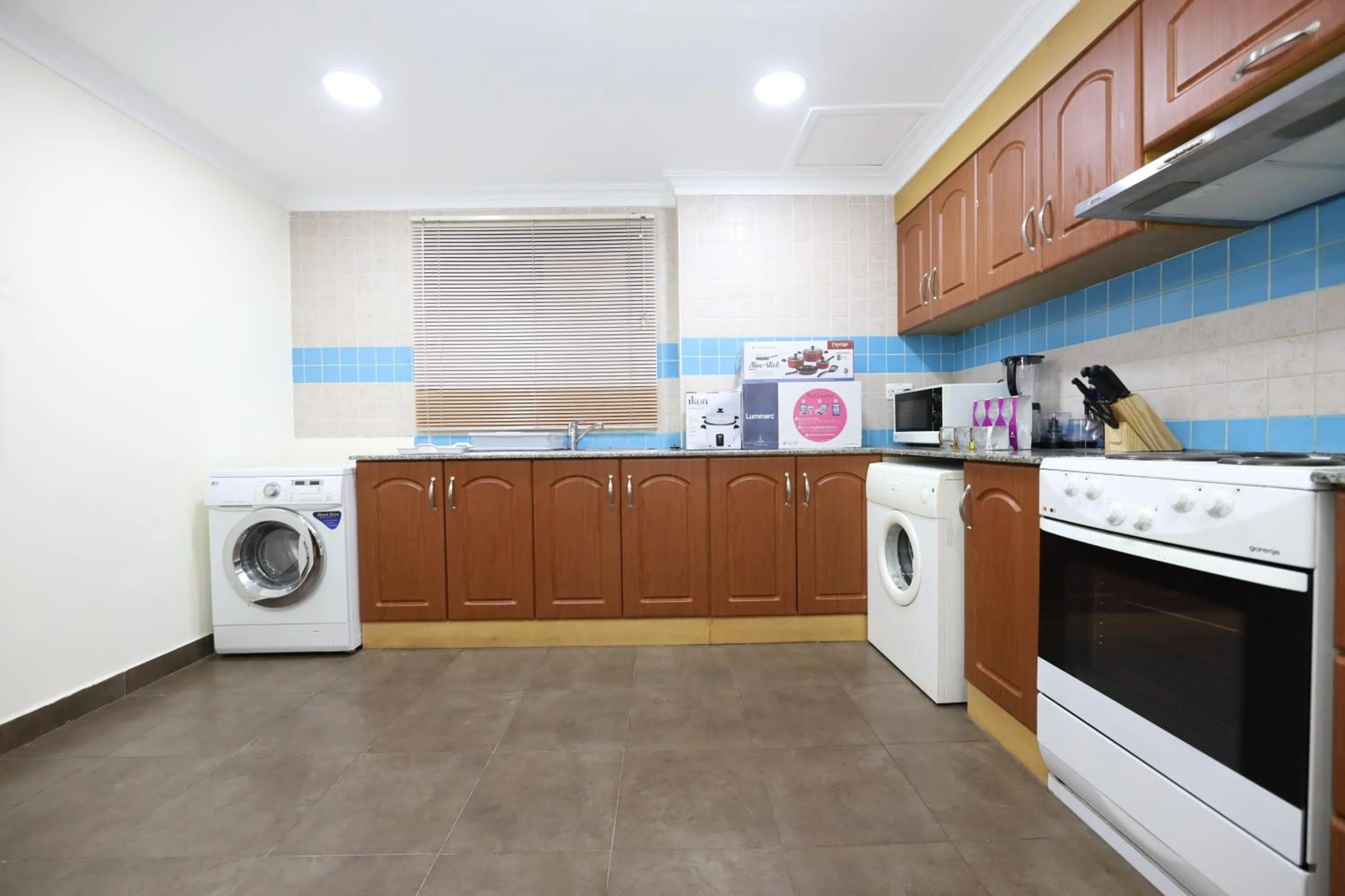 Kitchen or kitchenette in Pearl Bahrain Suites