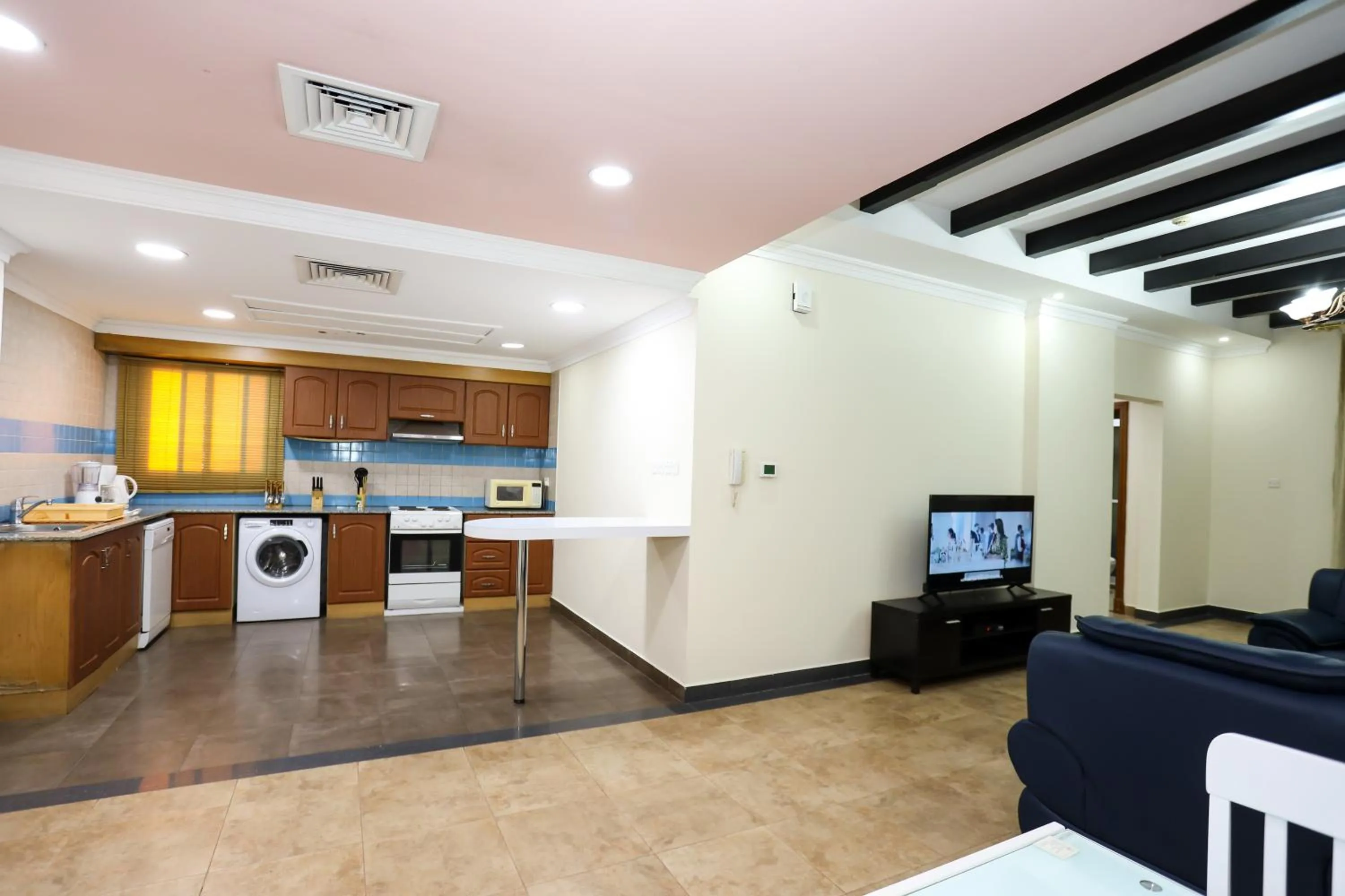 Kitchen or kitchenette in Pearl Bahrain Suites