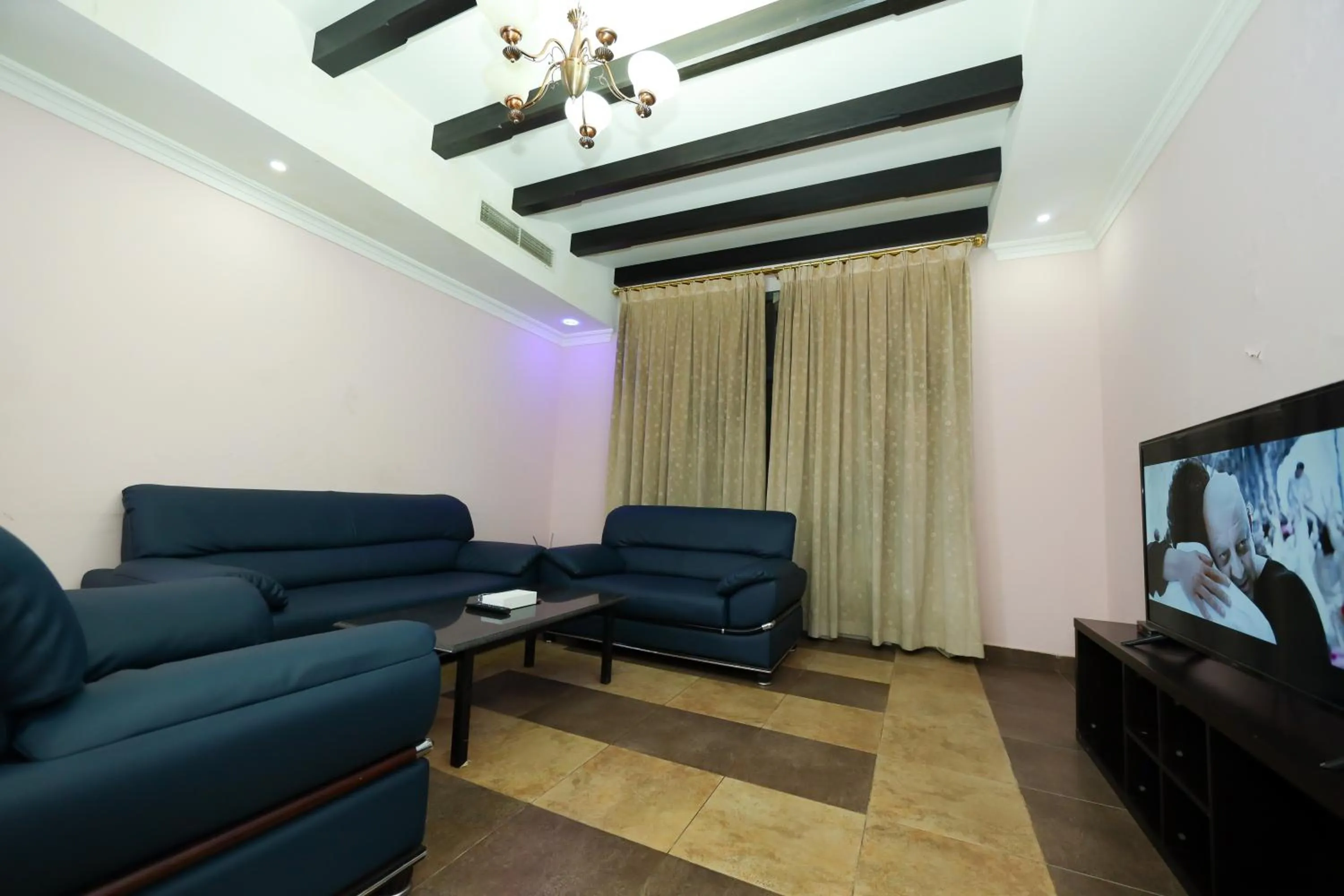 Living room in Pearl Bahrain Suites