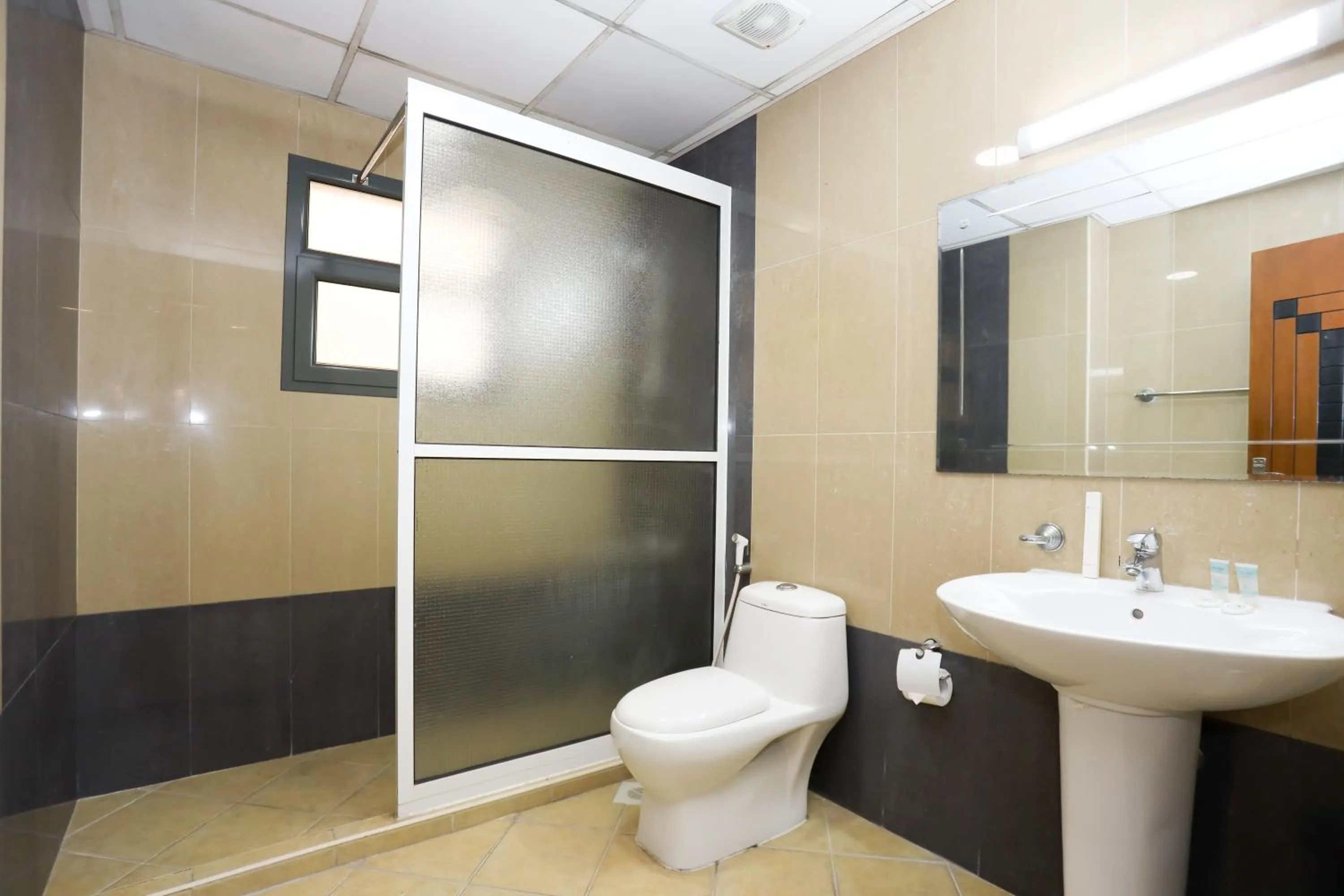 Shower in Pearl Bahrain Suites