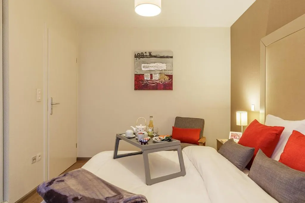 Bed in Zenao Appart'hôtels Strasbourg