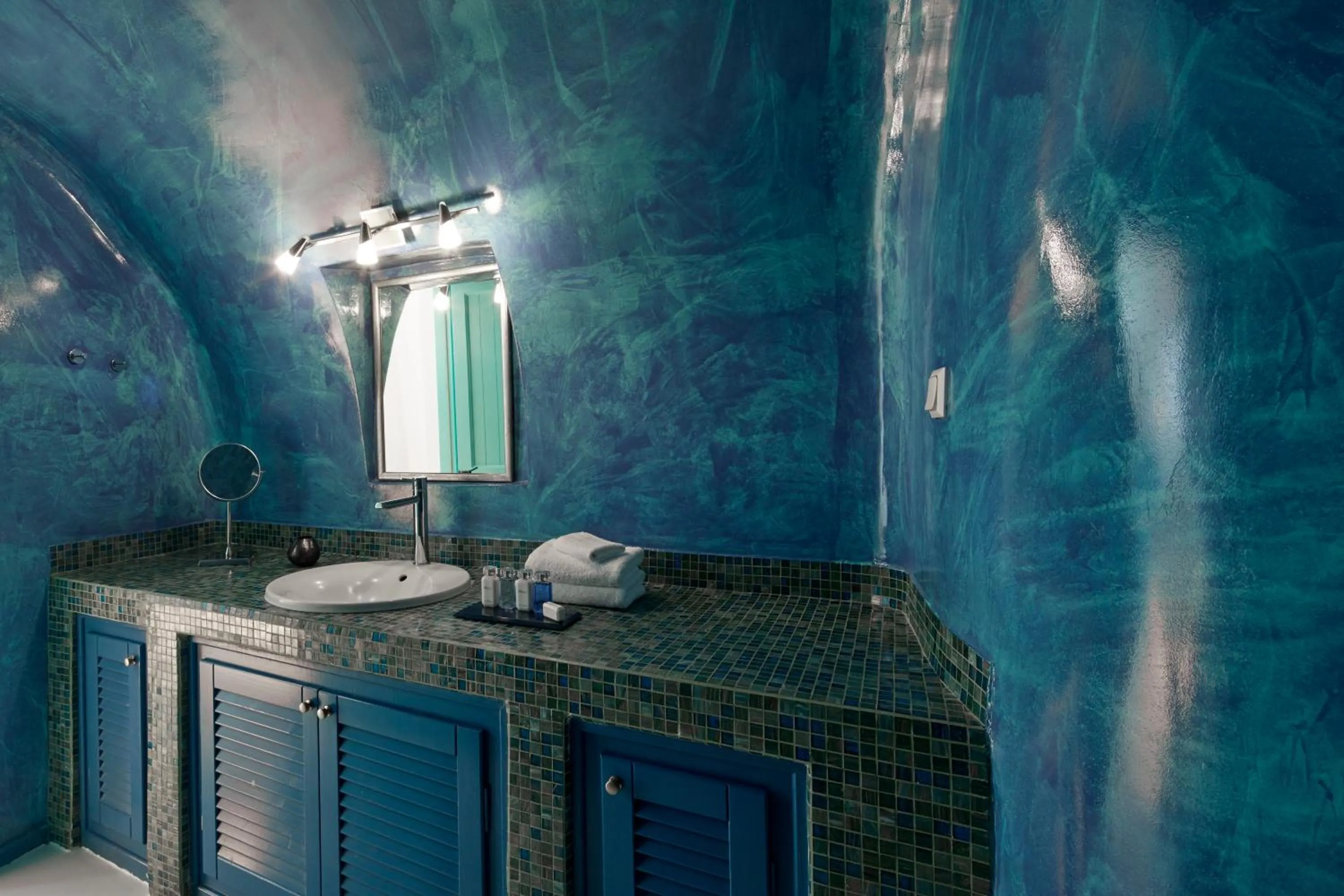 Bathroom in Dreams Luxury Suites