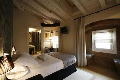 Bed in Hotel Palacio Muñatones