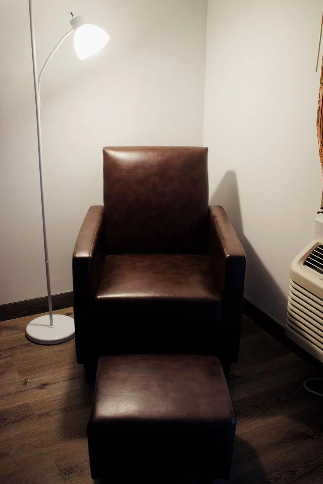 Seating area in Super 8 by Wyndham Daleville-Fort Novosel