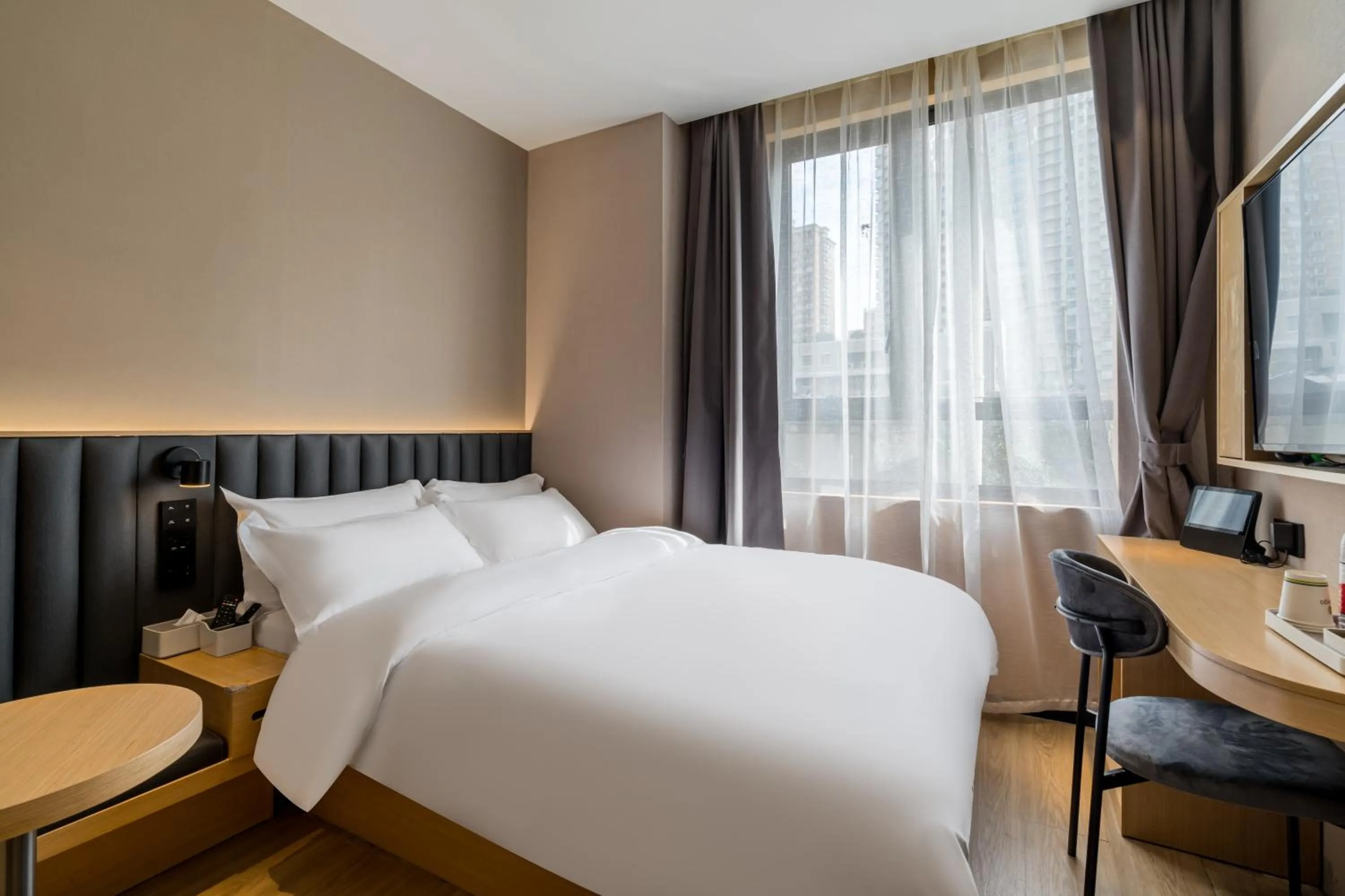 Bed in Meego Smart Select Hotel