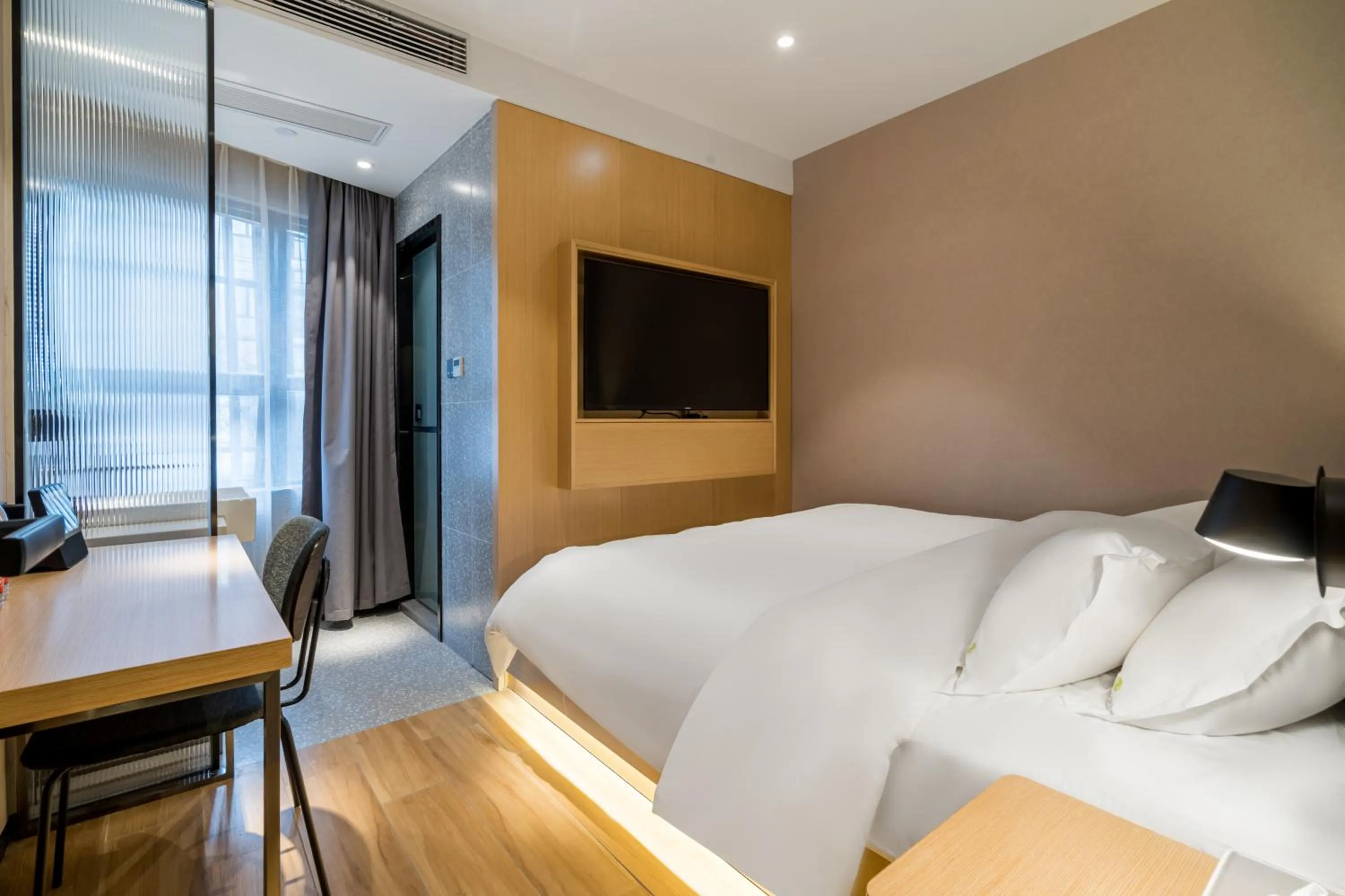 Bed in Meego Smart Select Hotel