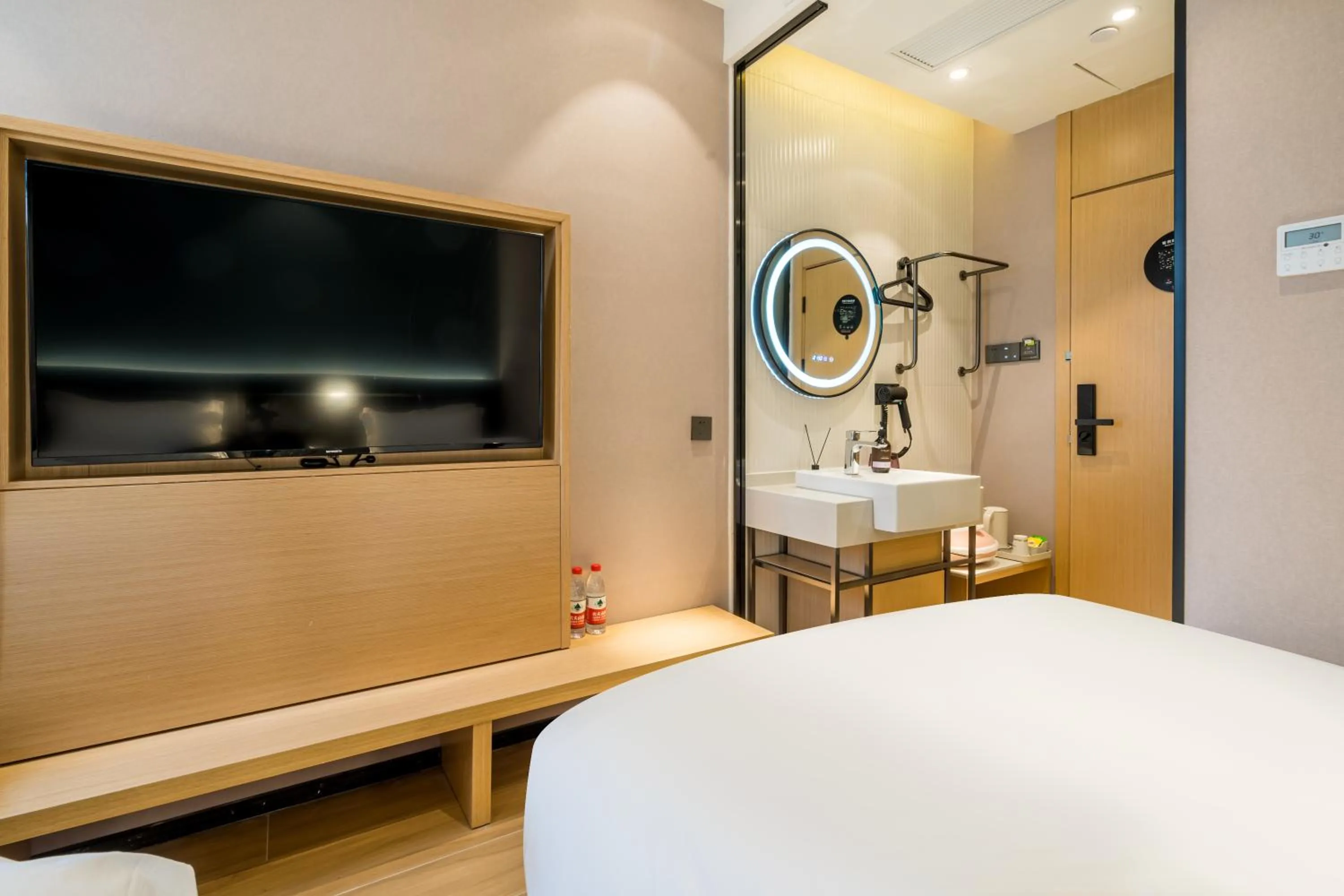 Bed in Meego Smart Select Hotel