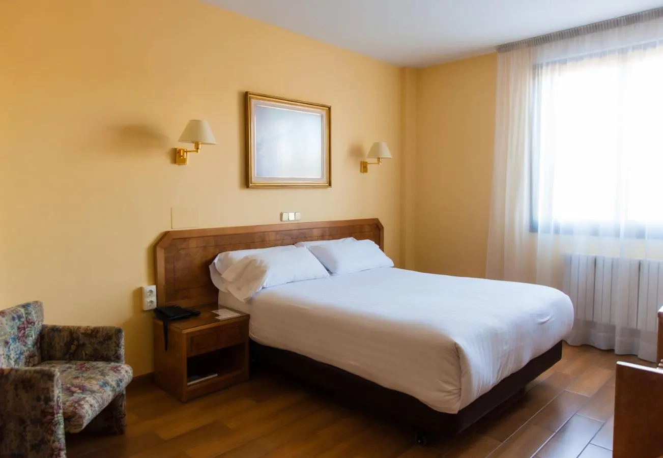 Bed in Hotel Don Carmelo