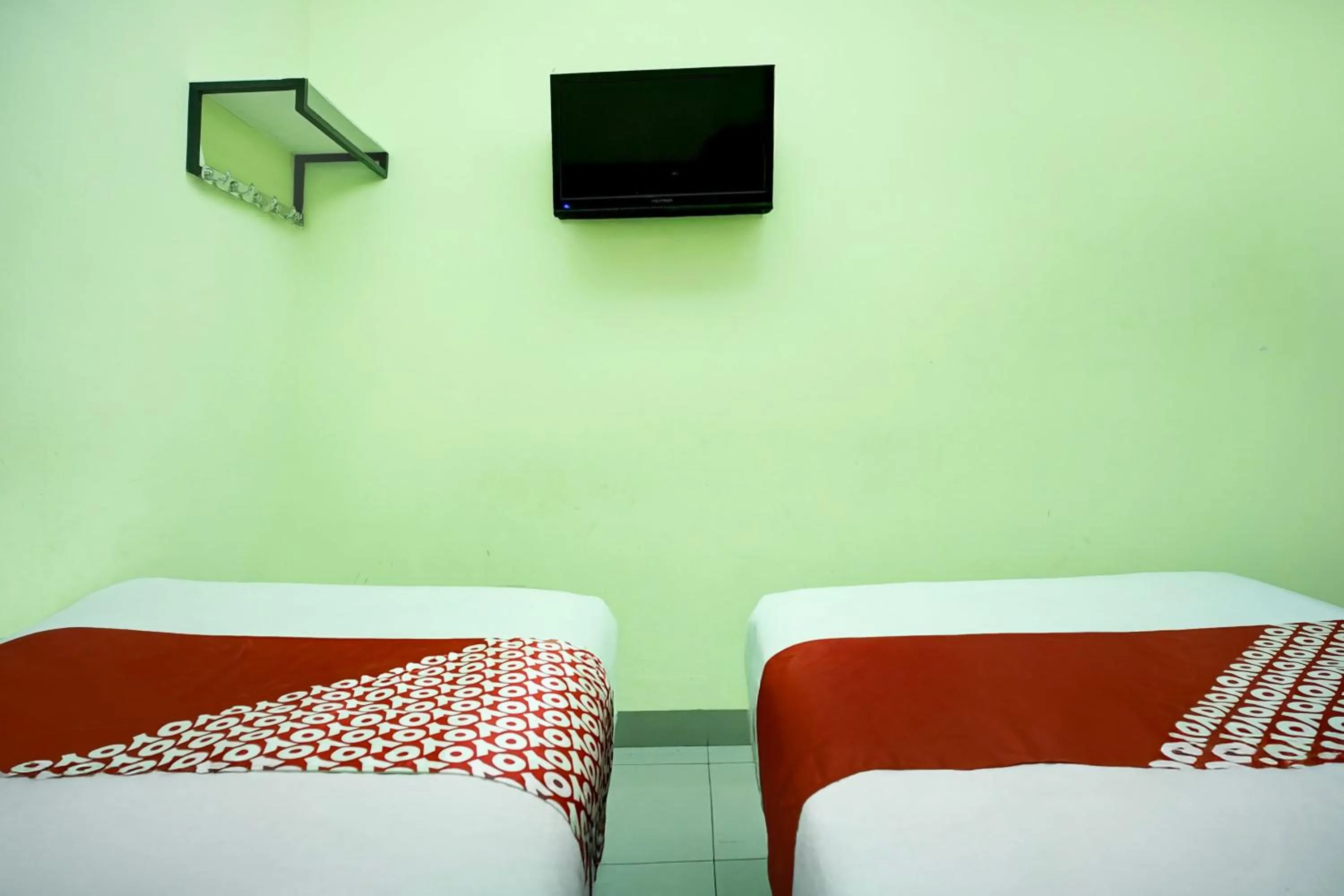 Bedroom, Bed in Hotel O Parapat Near Dermaga Ajibata Formerly Pudan Residence 2