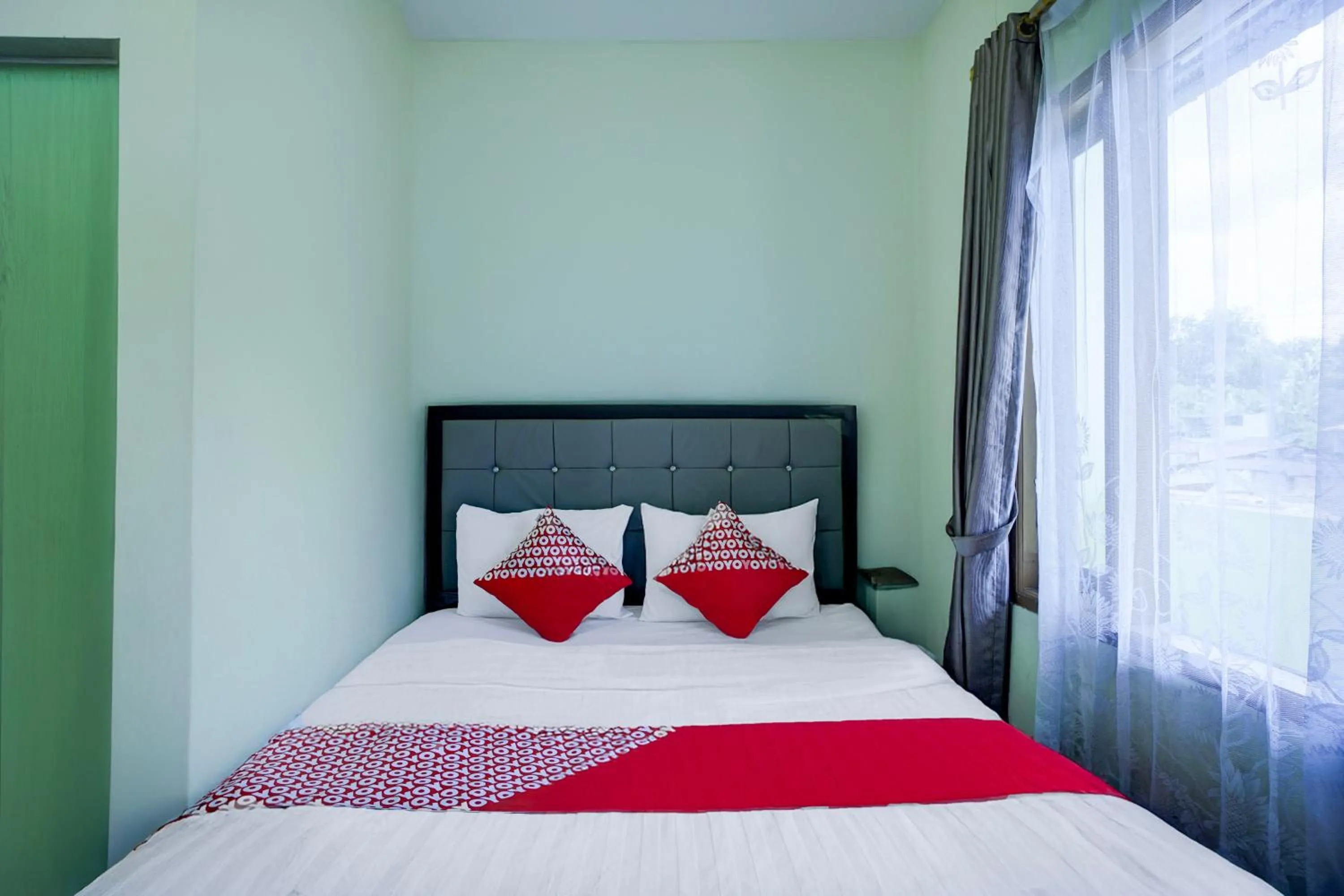 Bedroom, Bed in Hotel O Parapat Near Dermaga Ajibata Formerly Pudan Residence 2