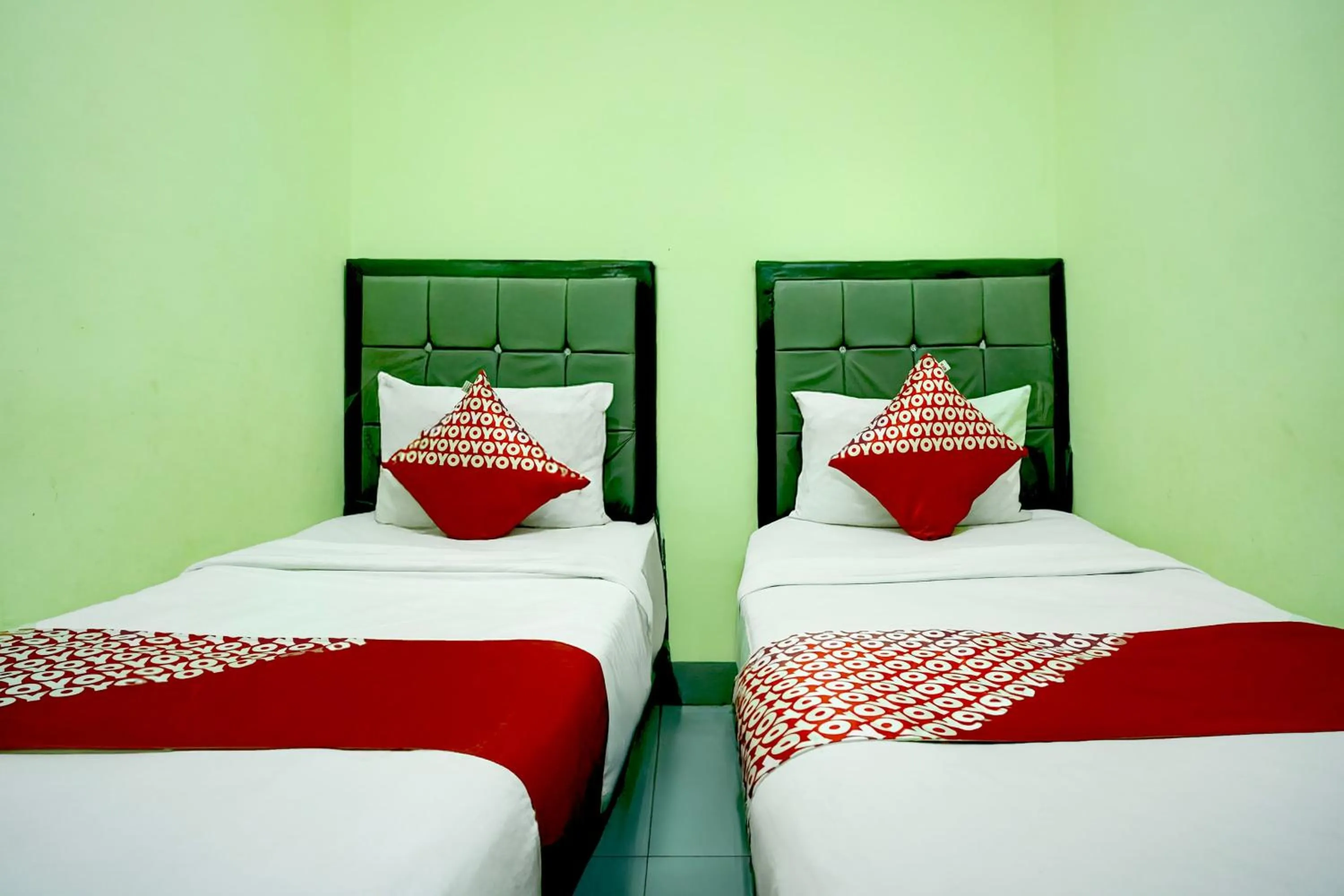 Bedroom, Bed in Hotel O Parapat Near Dermaga Ajibata Formerly Pudan Residence 2