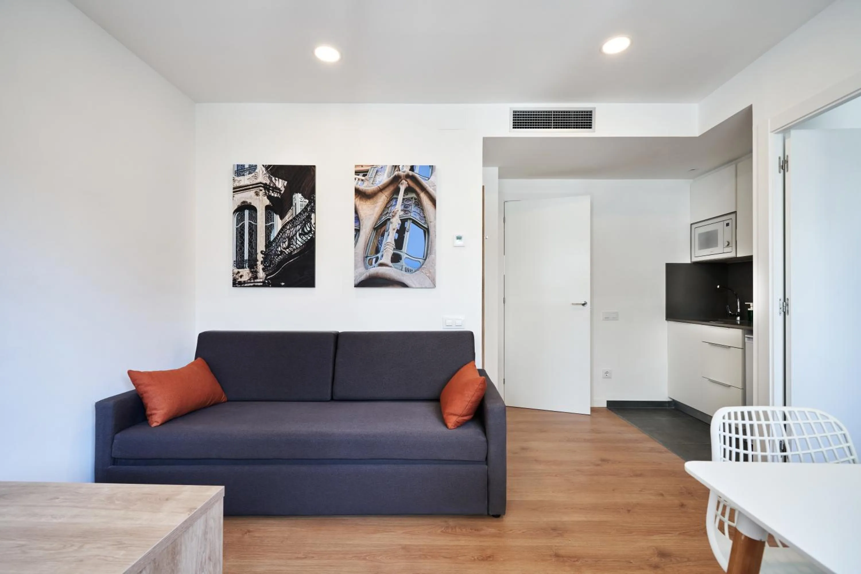 Communal lounge/ TV room in Aparthotel Augusta