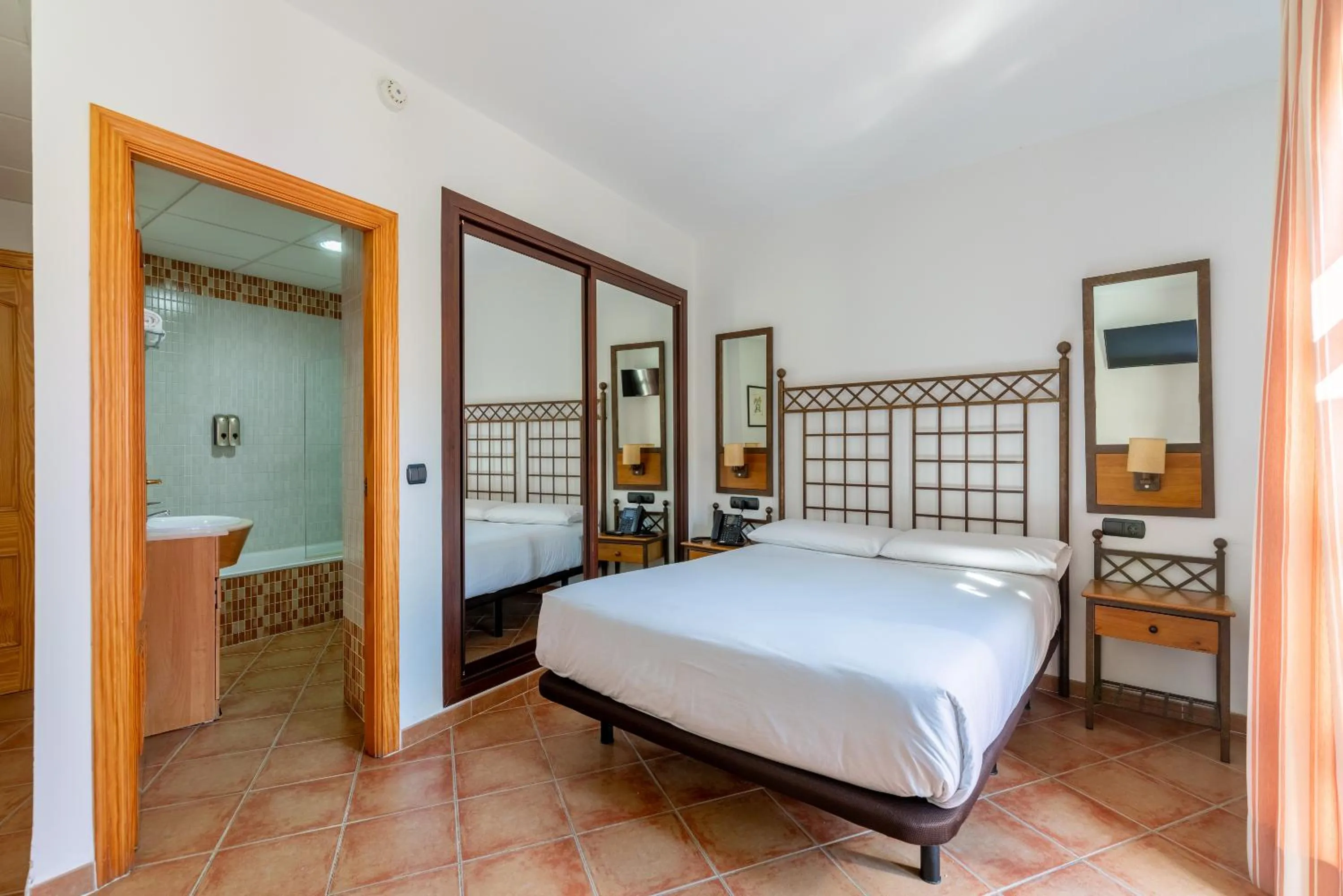 Bed in HOTEL HACIENDA SANTA BARBARA