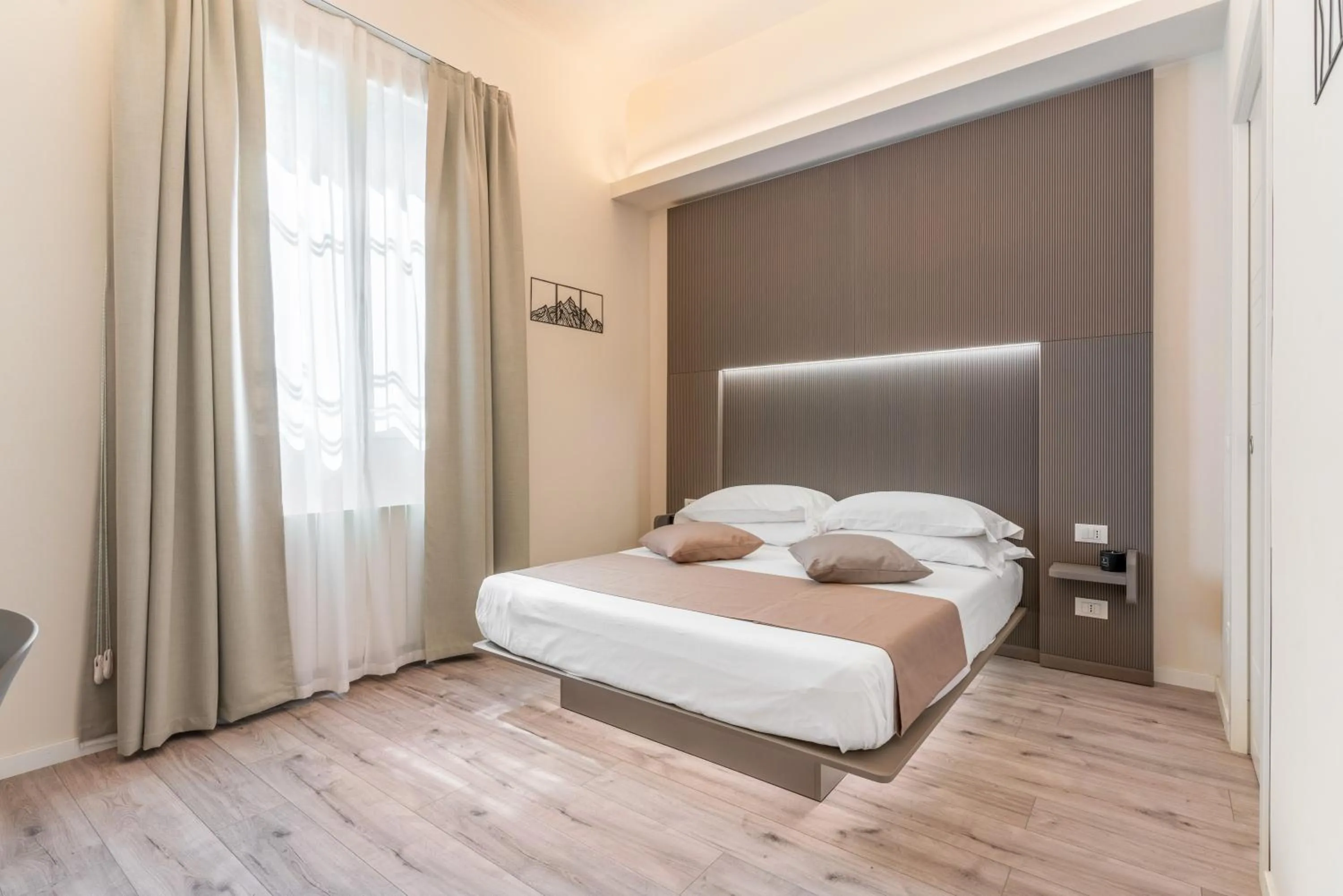 Bed in Meneghina Suites Foresteria Lombarda