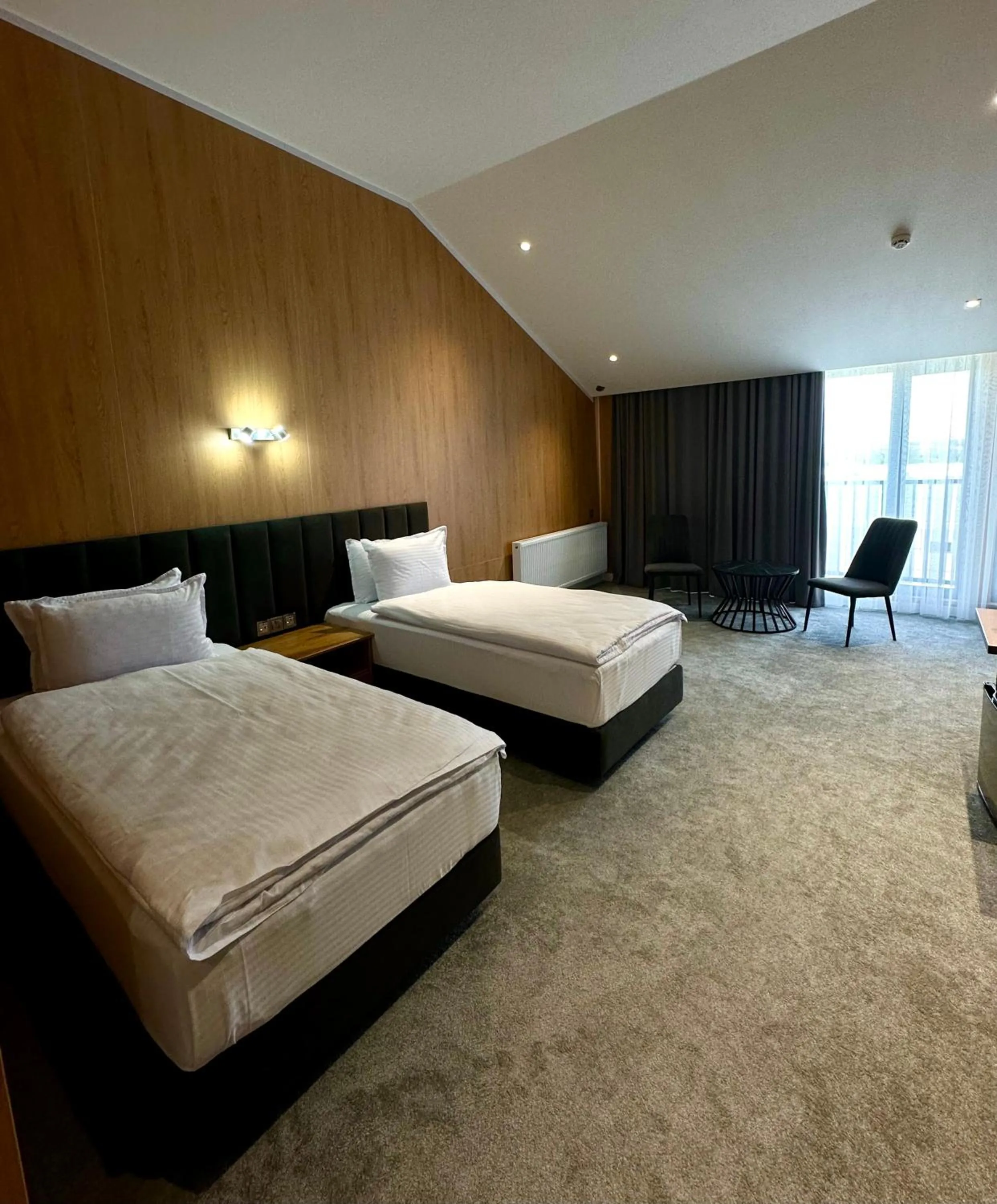 Bed in WELLFORT HOTEL