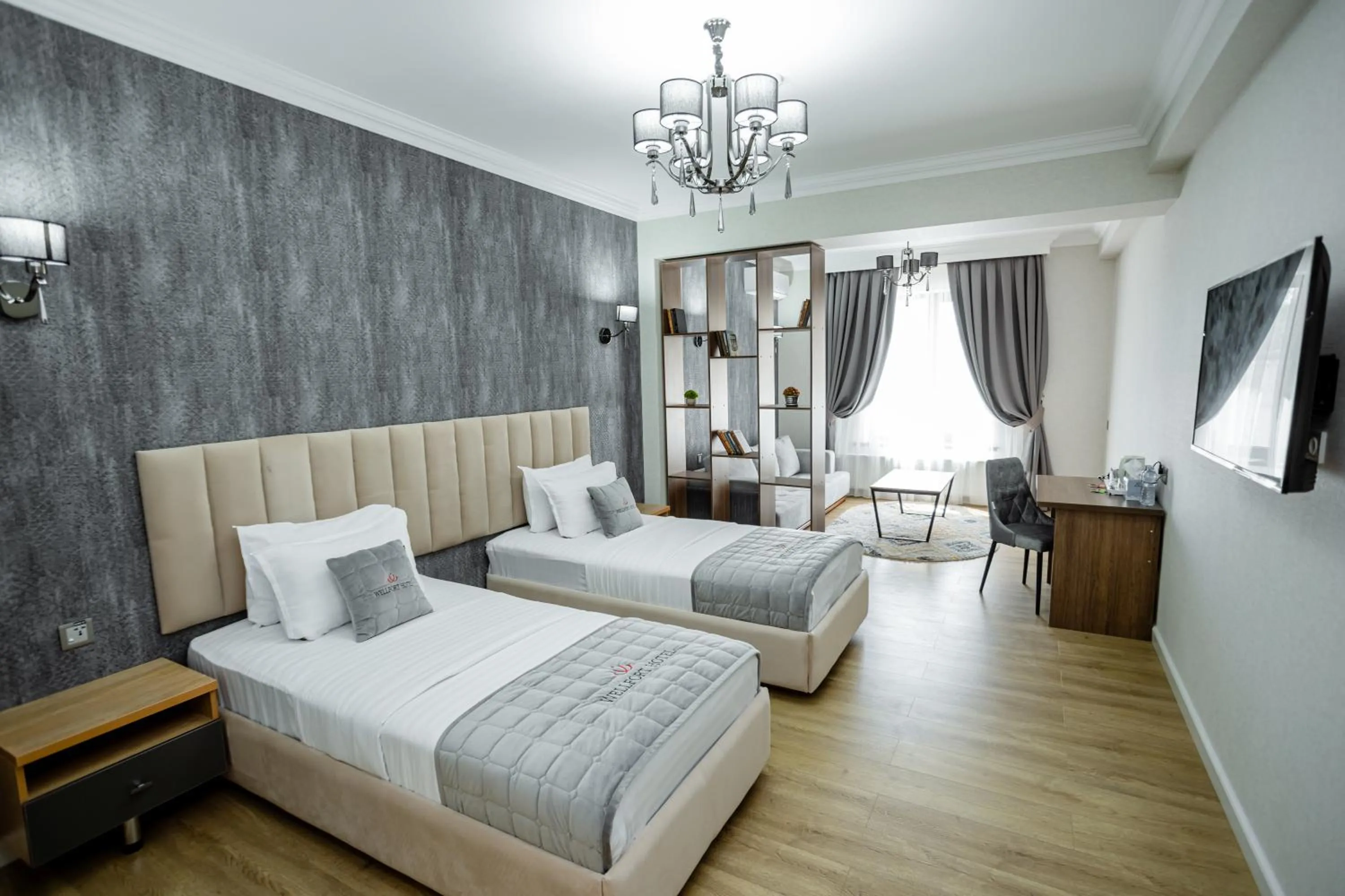 Bed in WELLFORT HOTEL