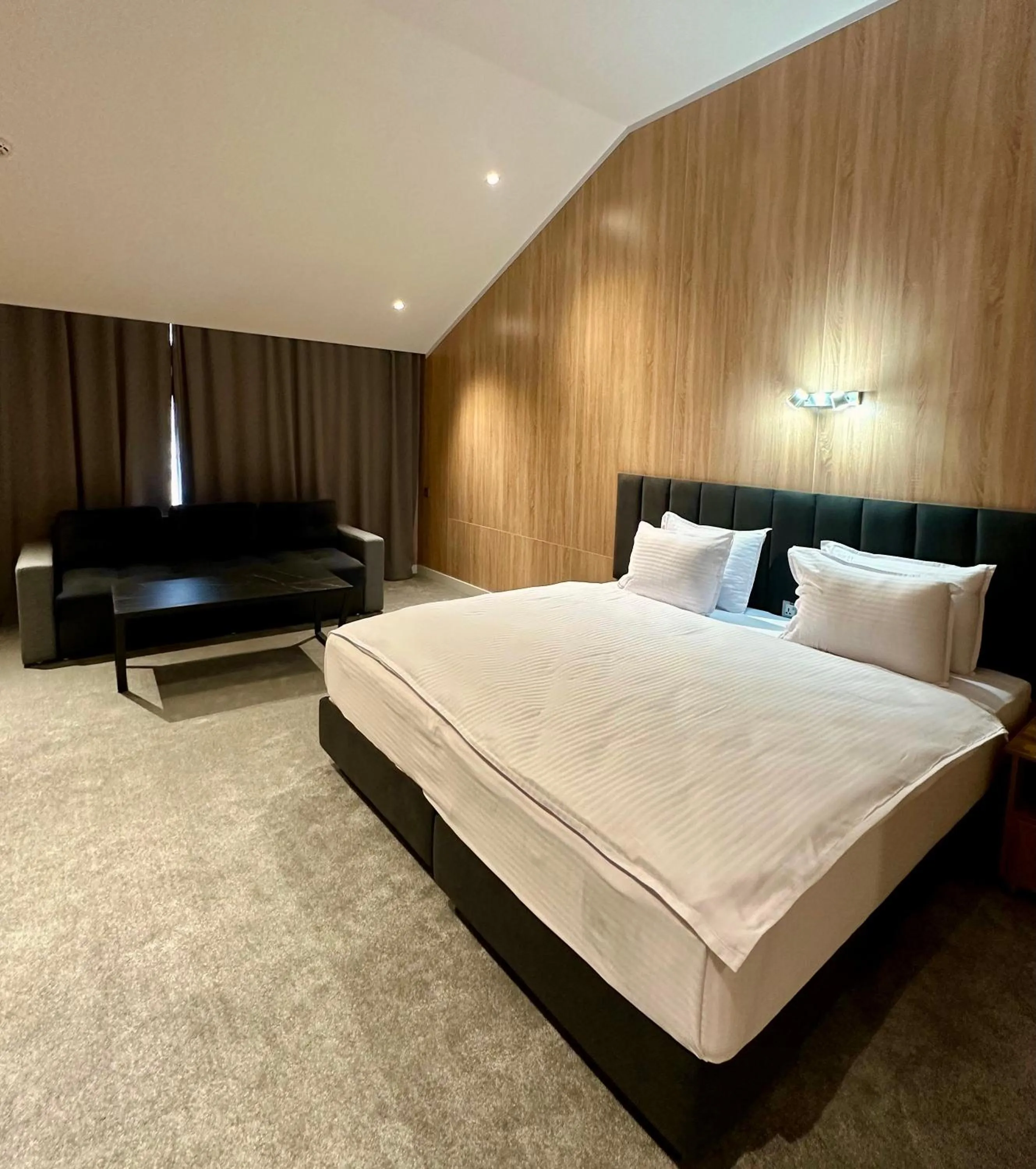 Bed in WELLFORT HOTEL