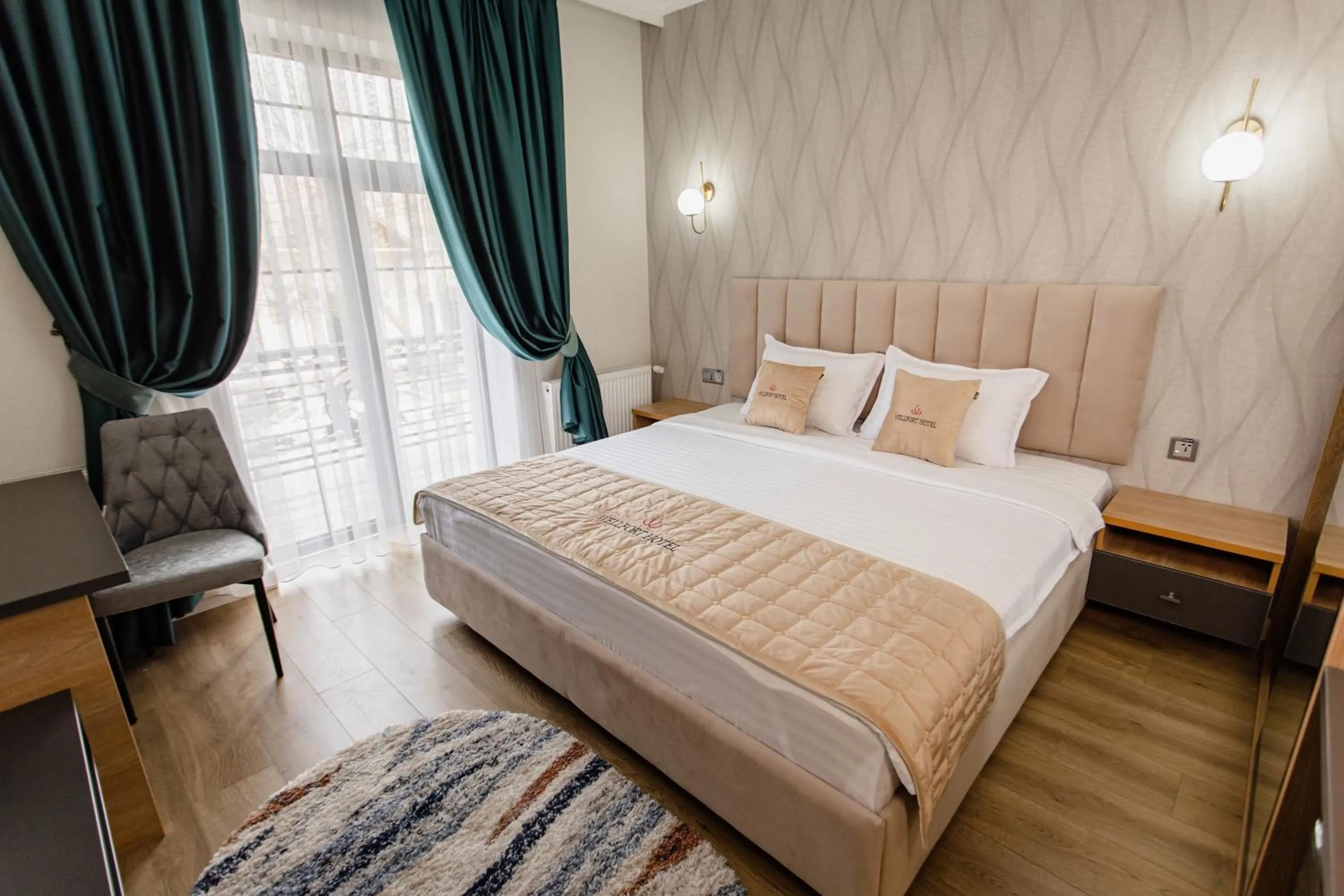 Balcony/Terrace, Bed in WELLFORT HOTEL