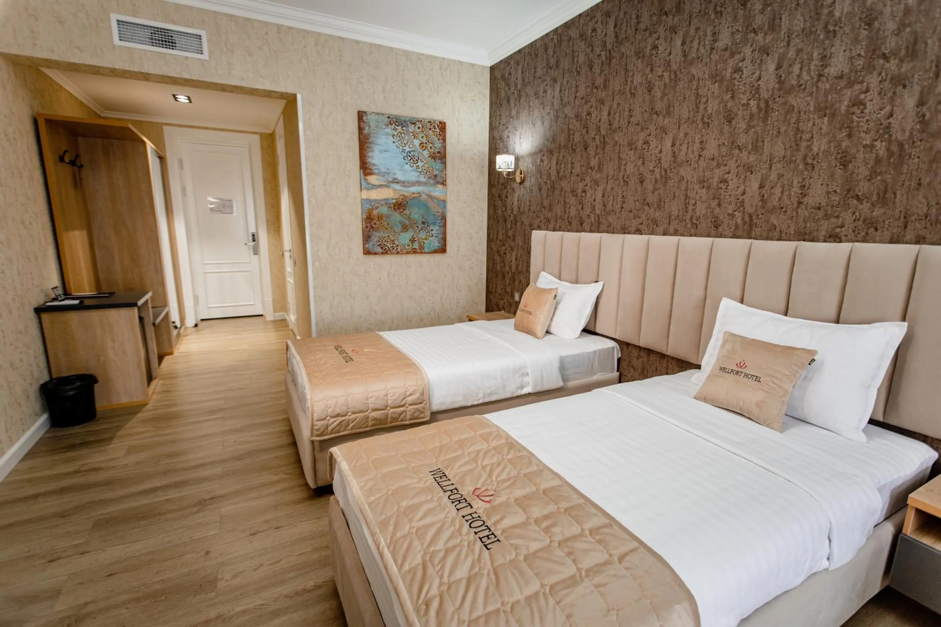 Bed in WELLFORT HOTEL