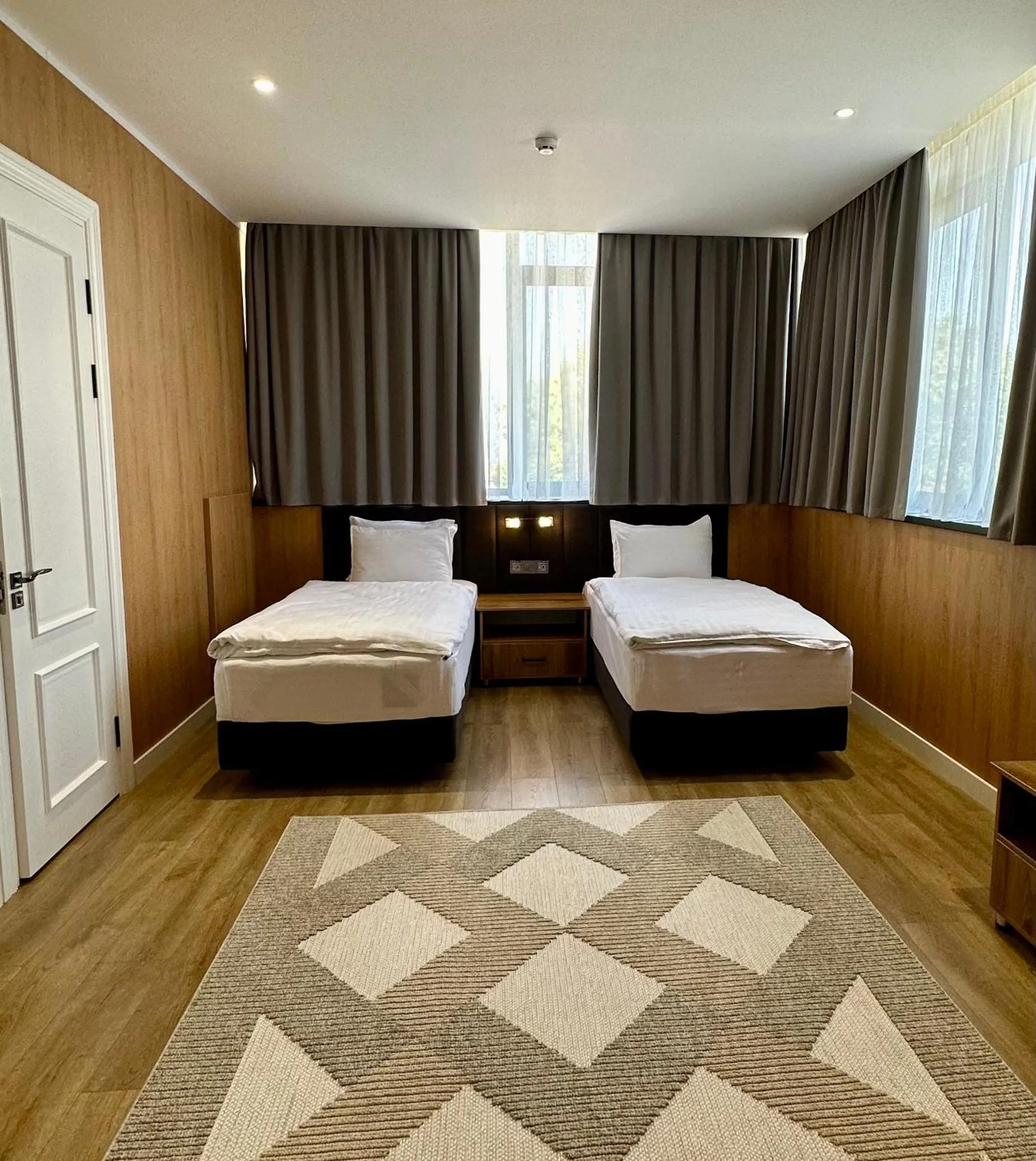 Bed in WELLFORT HOTEL