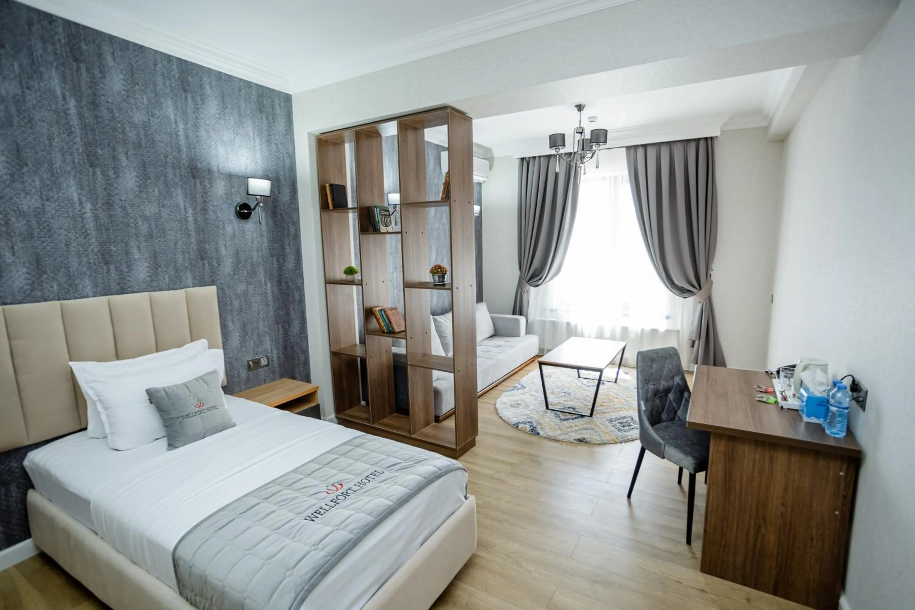 Bed in WELLFORT HOTEL