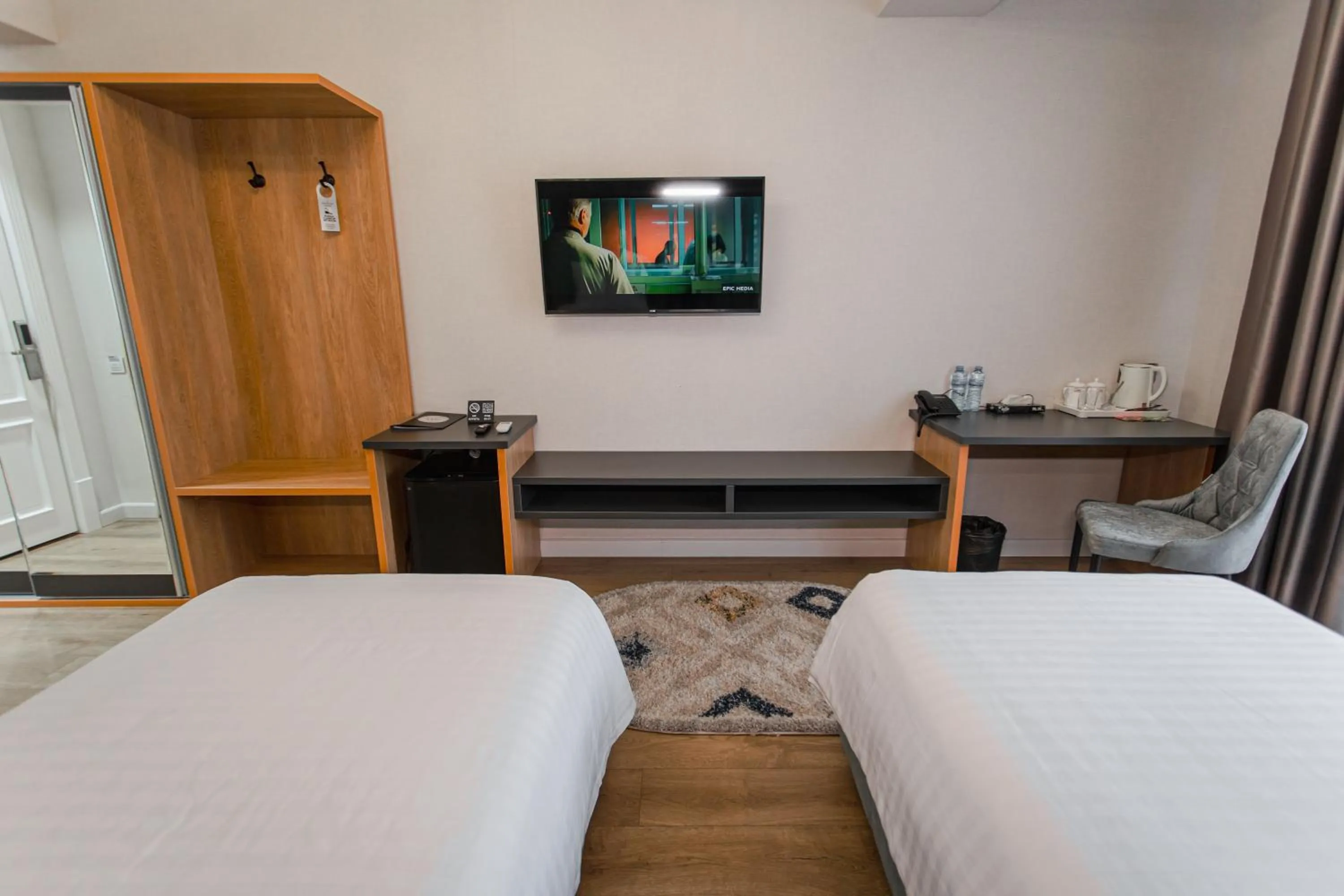 Bed in WELLFORT HOTEL