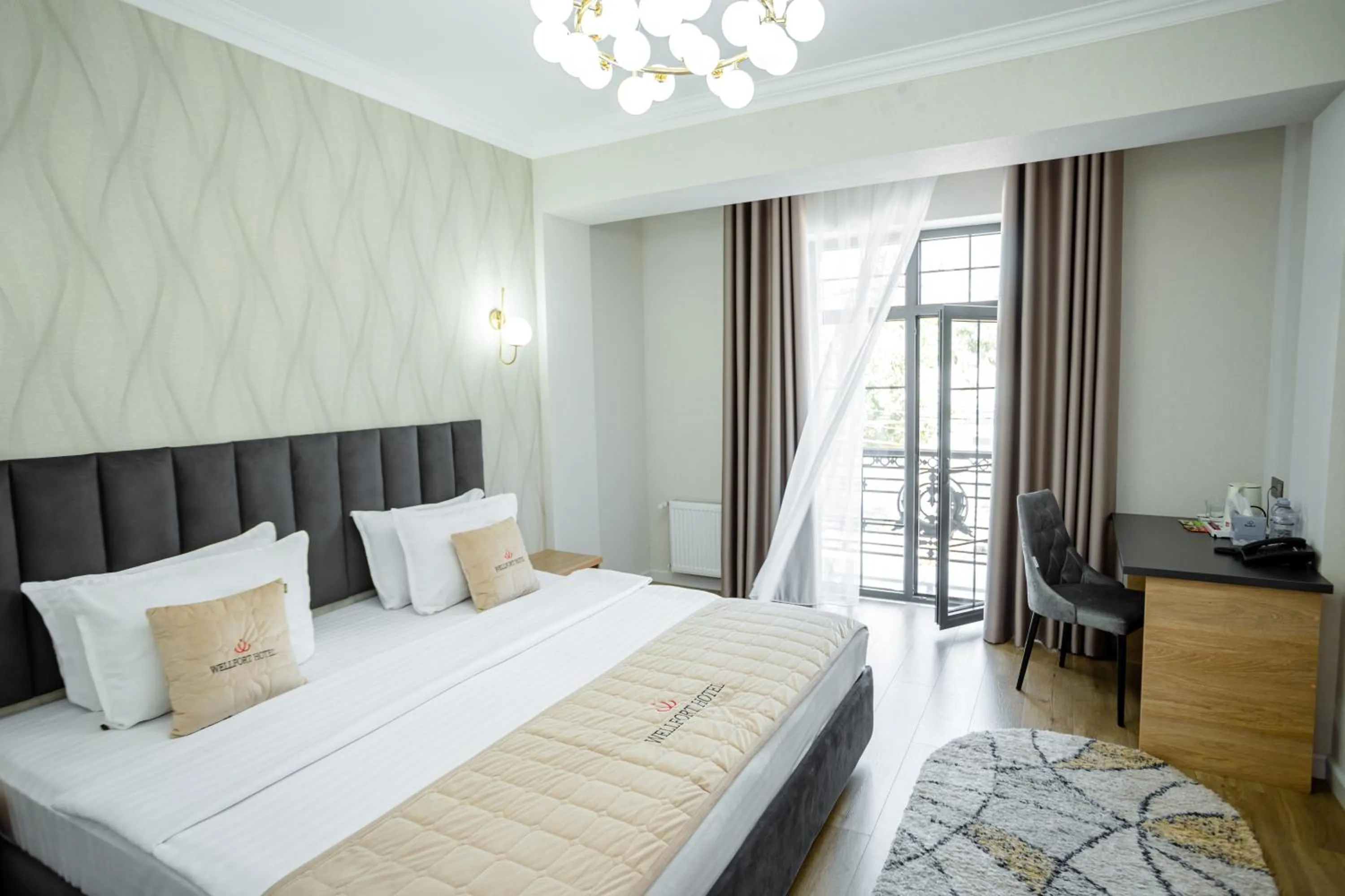 Bed in WELLFORT HOTEL