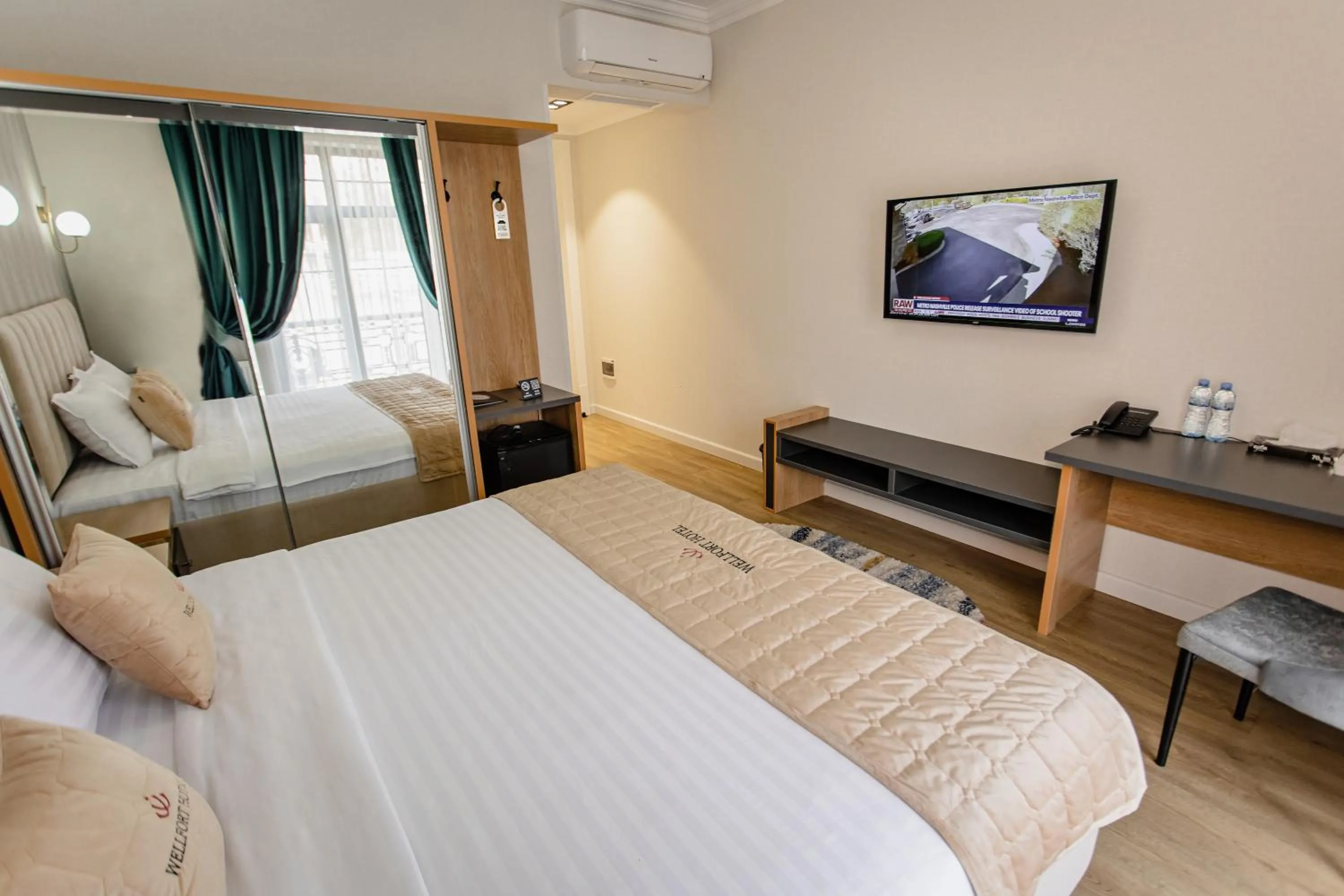 Bed in WELLFORT HOTEL