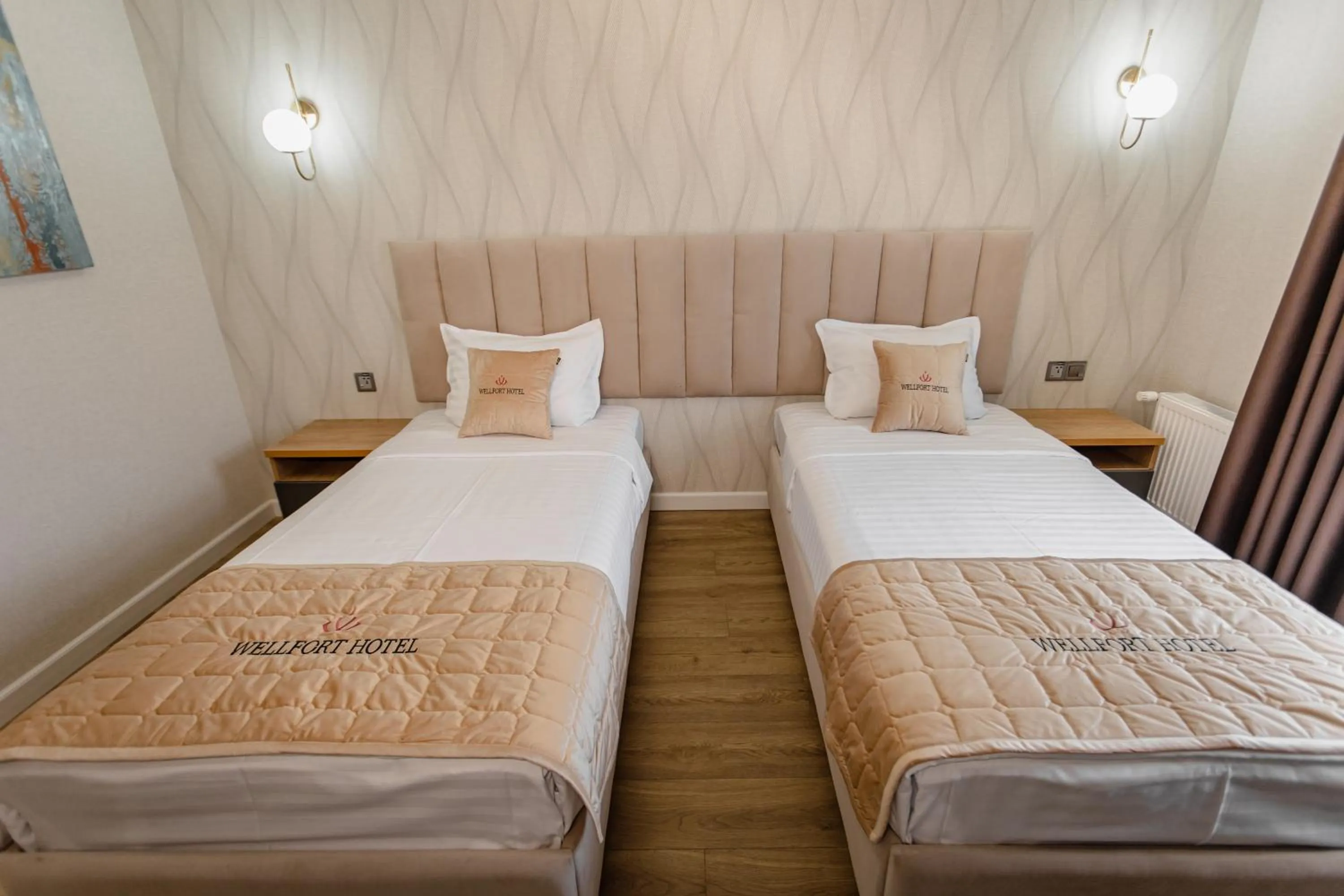 Bed in WELLFORT HOTEL