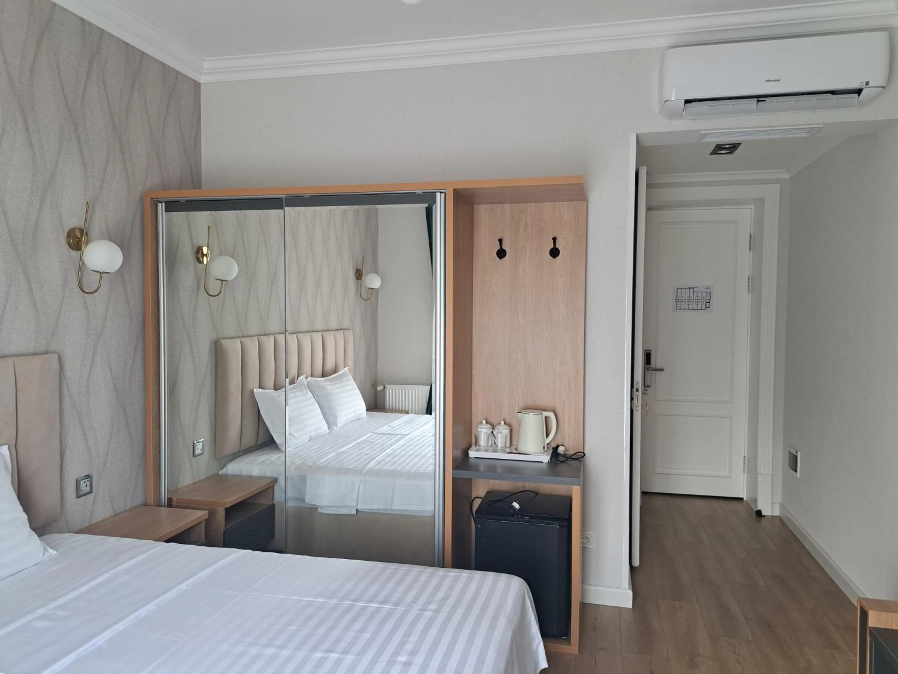 Bed in WELLFORT HOTEL