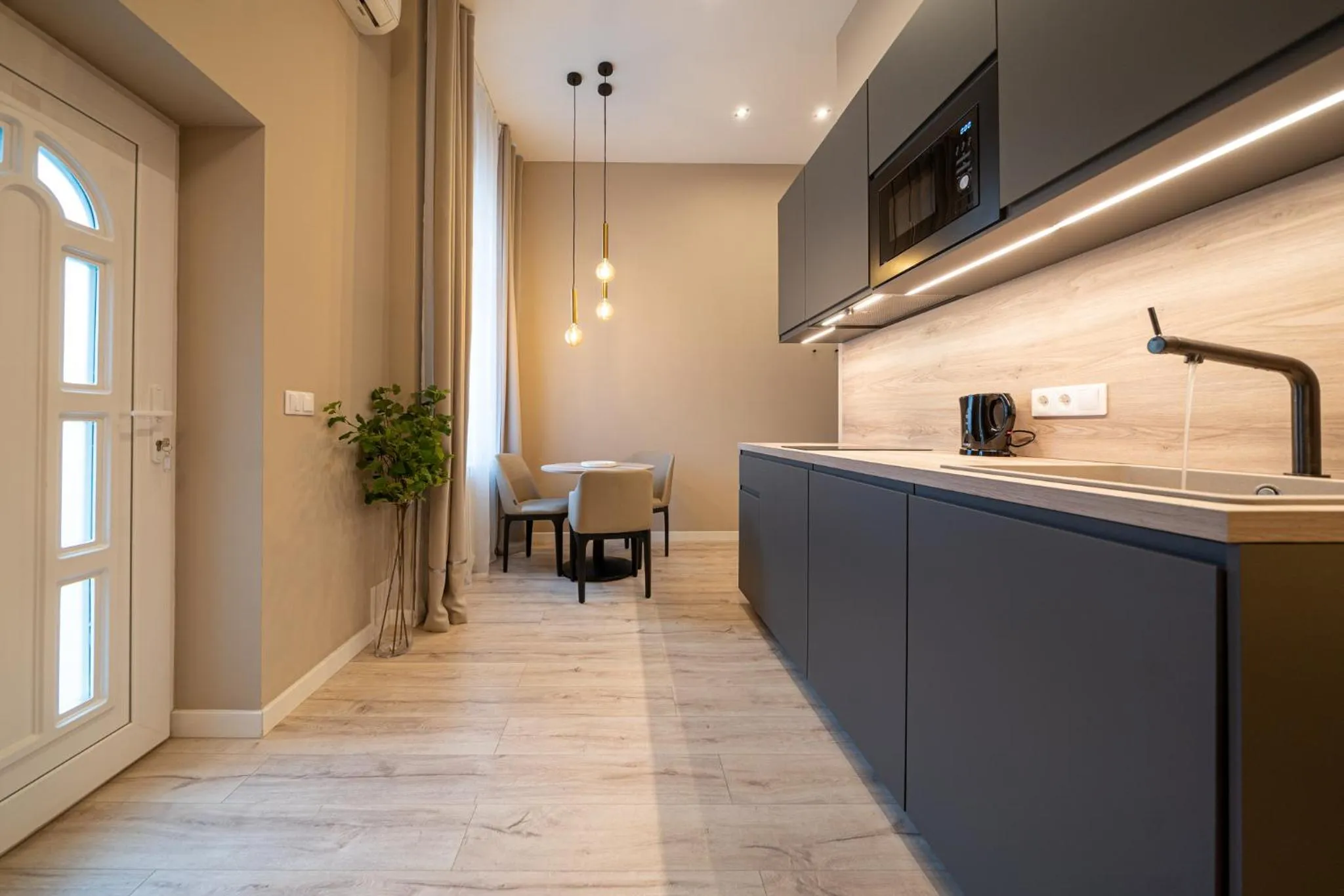 Kitchen or kitchenette in Karoly Boutique Suites, Best Location by BQA