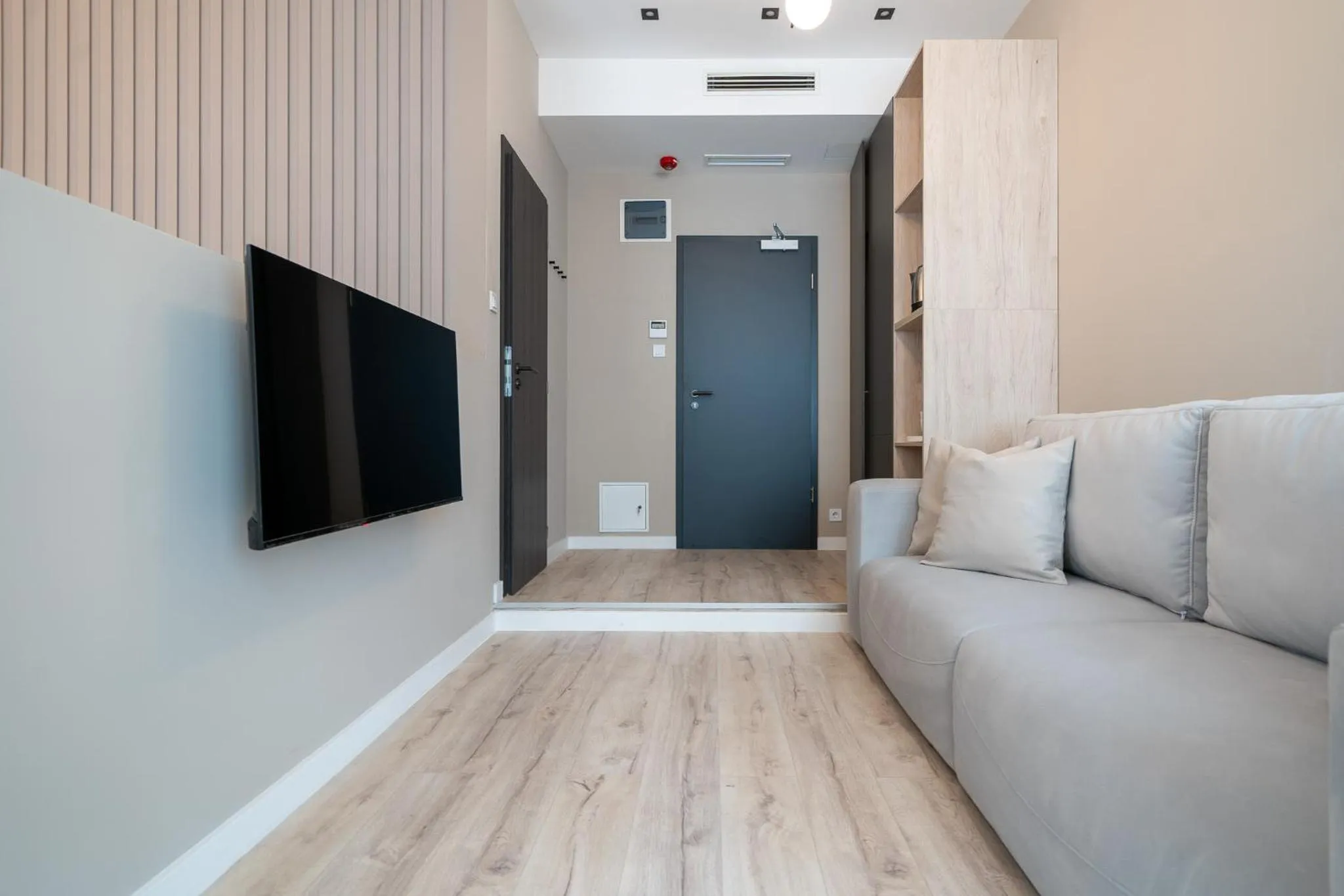 TV and multimedia in Karoly Boutique Suites, Best Location by BQA