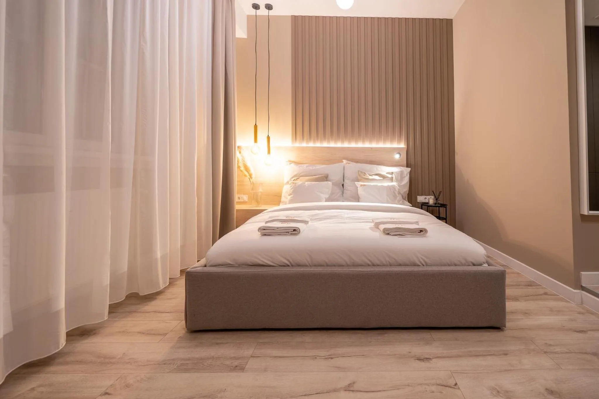 Bed in Karoly Boutique Suites, Best Location by BQA