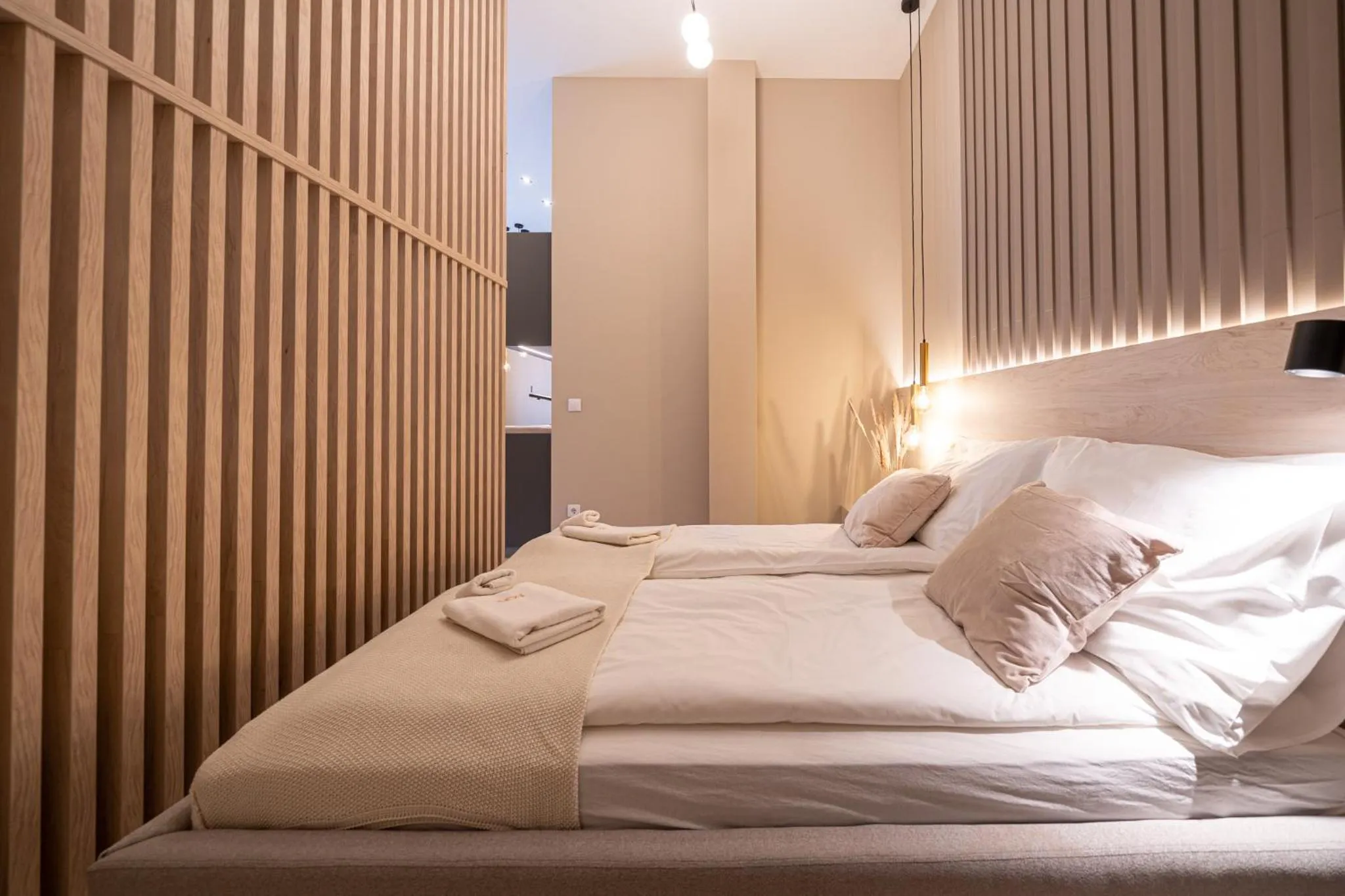 Bed in Karoly Boutique Suites, Best Location by BQA