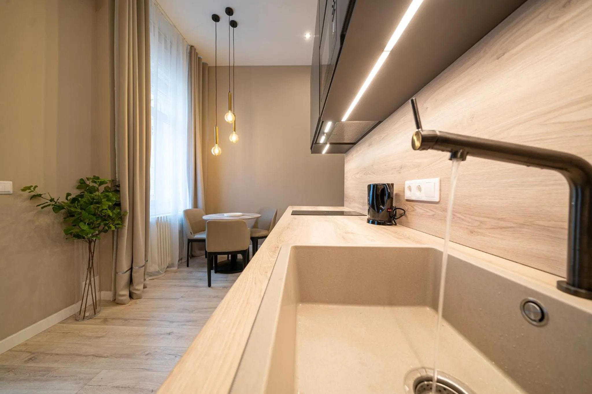 Kitchen or kitchenette in Karoly Boutique Suites, Best Location by BQA