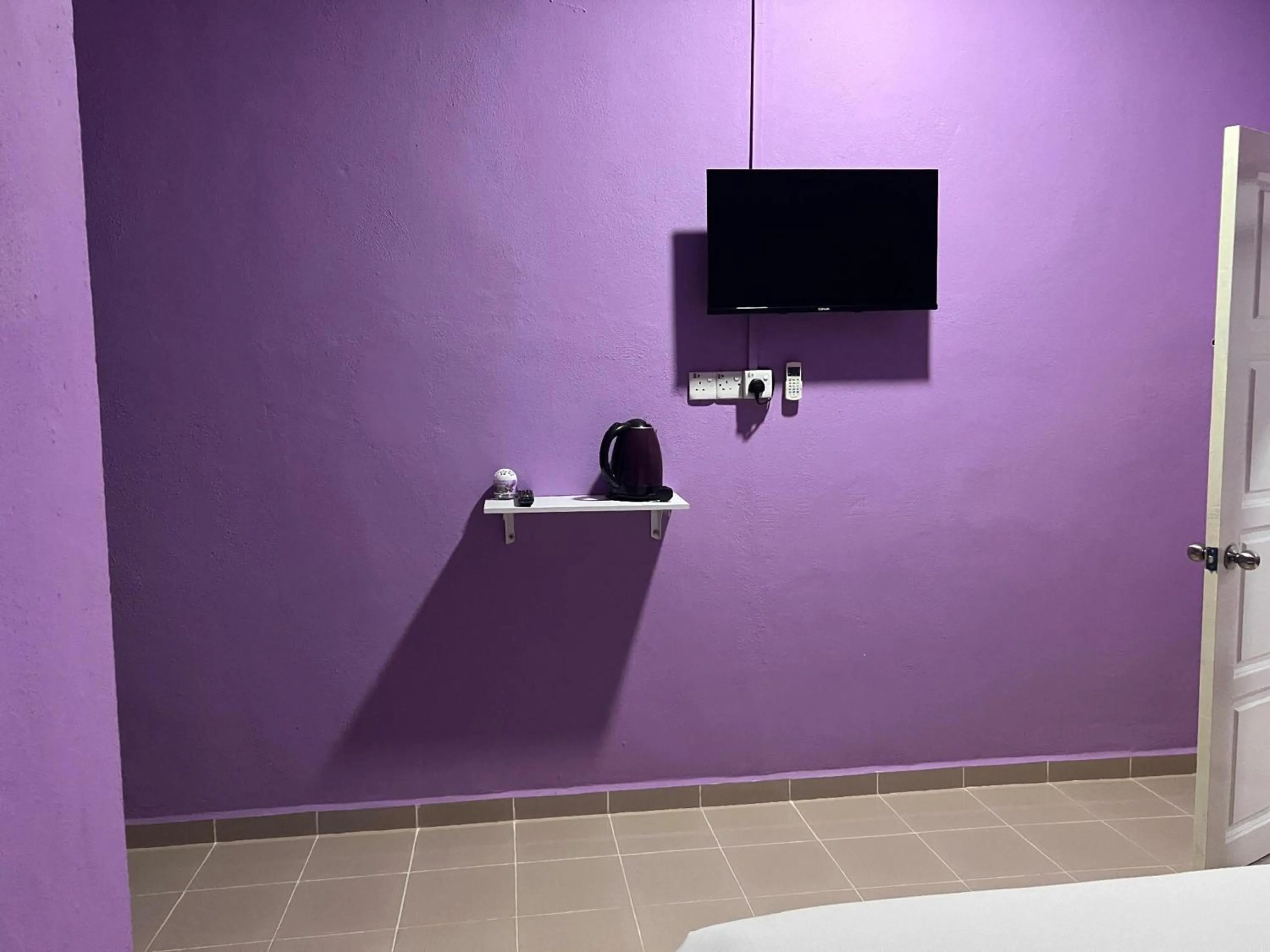 Photo of the whole room in Hotel O Brick Cottage Homes