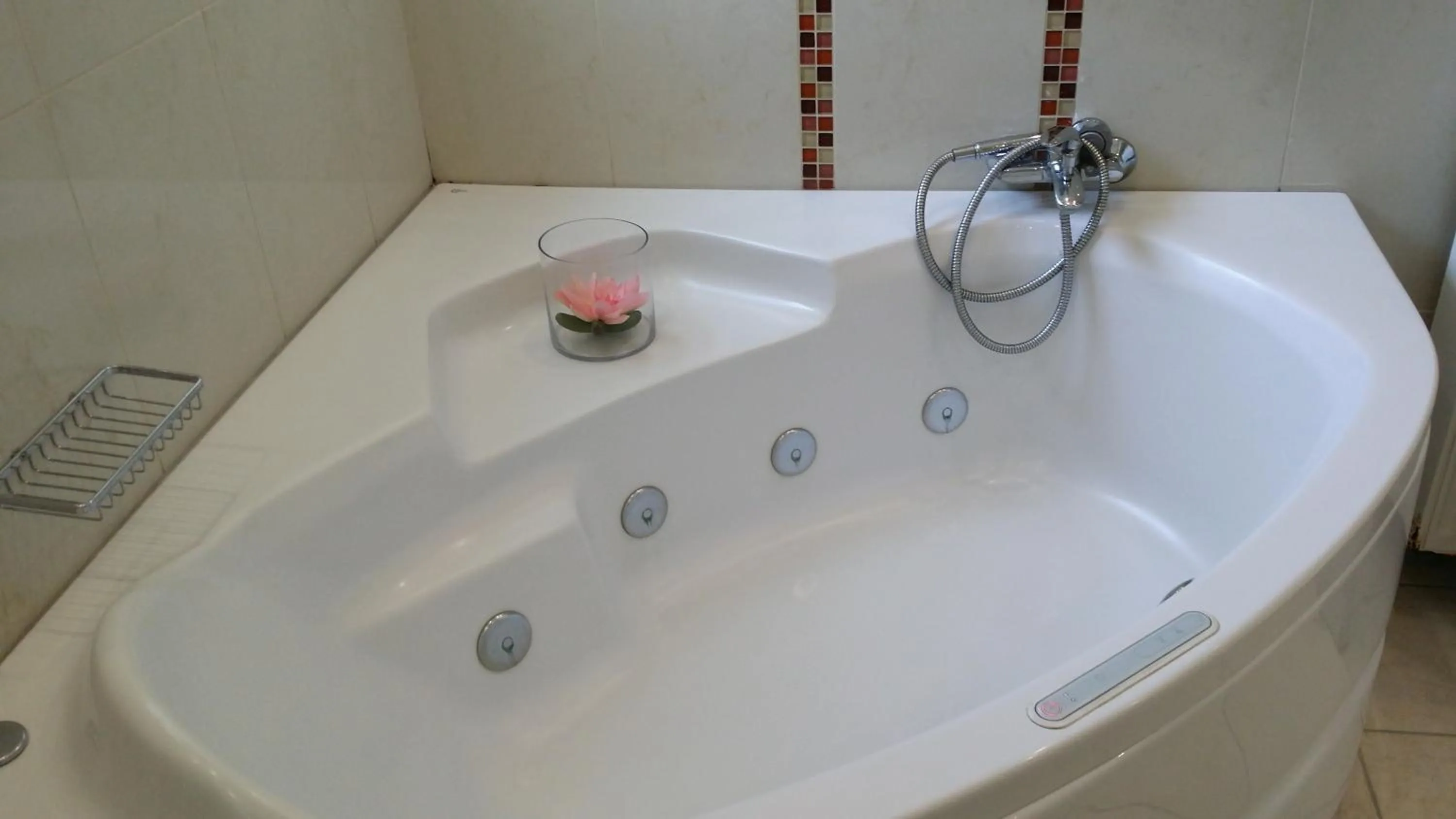 Bathroom in New Aegli Resort Hotel