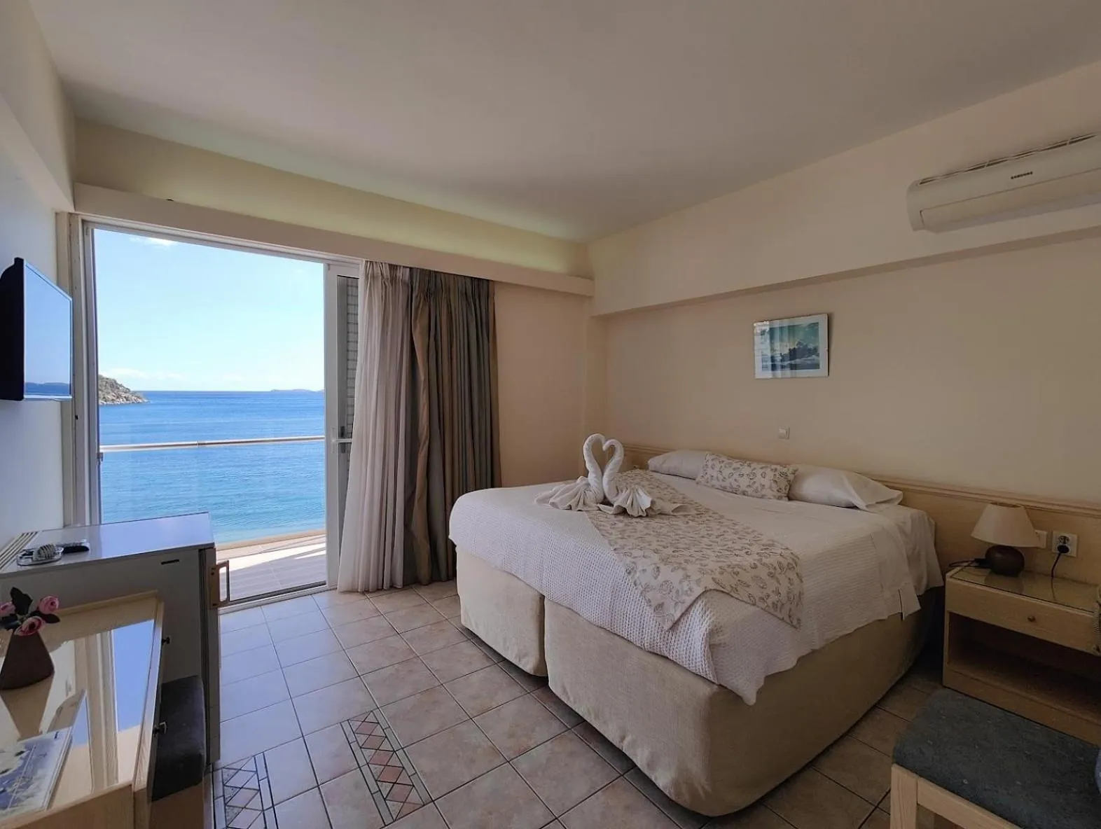 Bed in New Aegli Resort Hotel