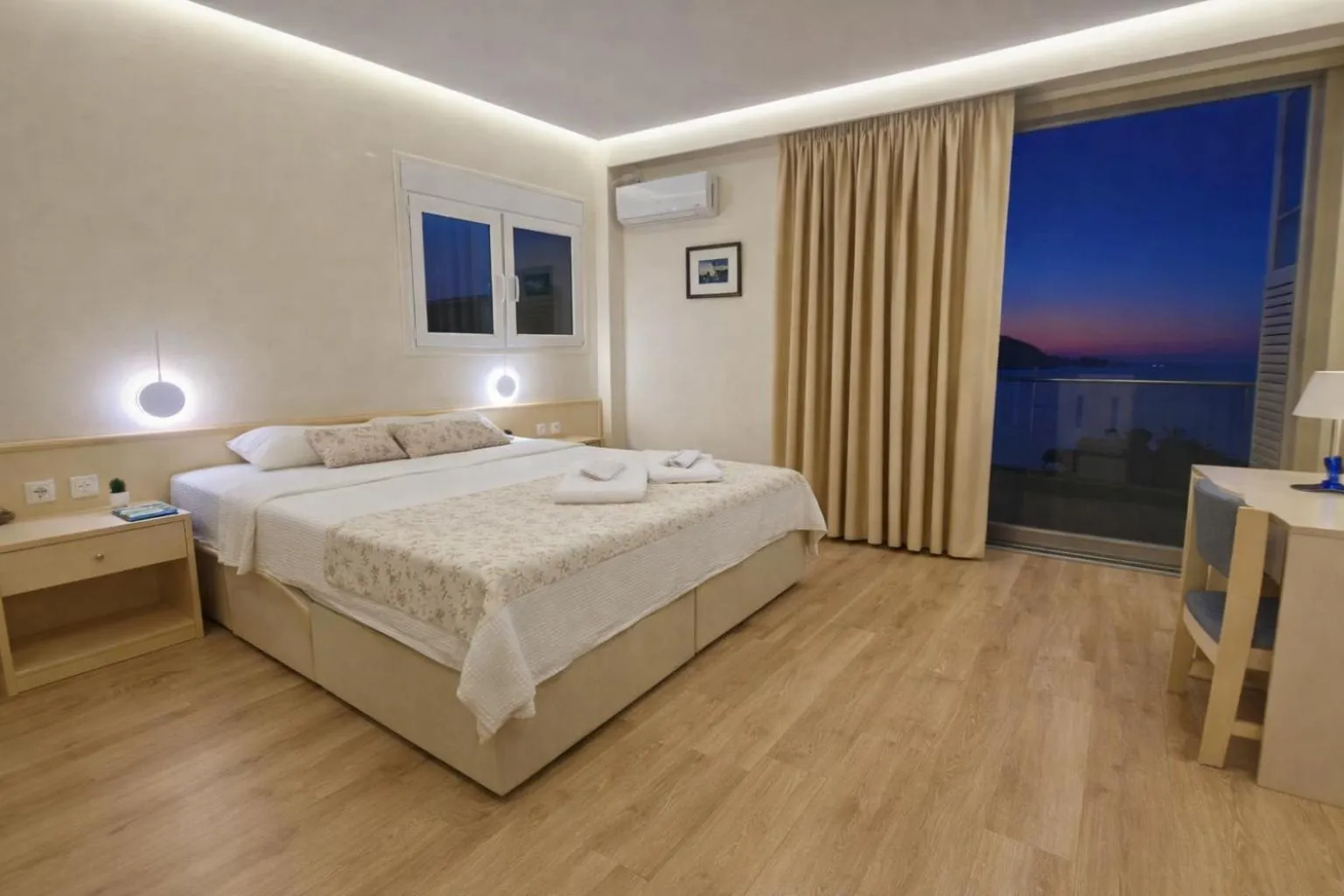 Bed in New Aegli Resort Hotel