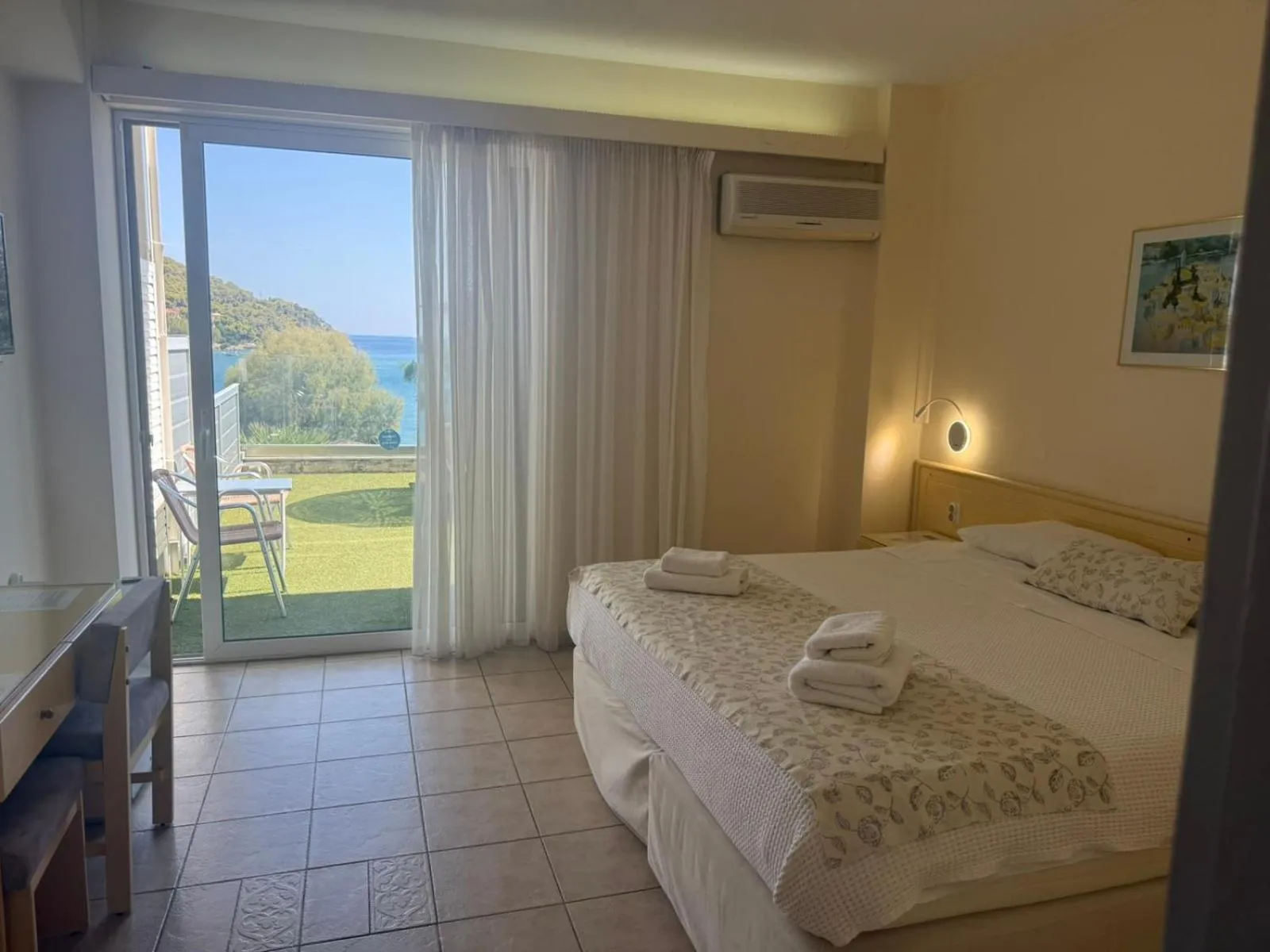 Bed in New Aegli Resort Hotel